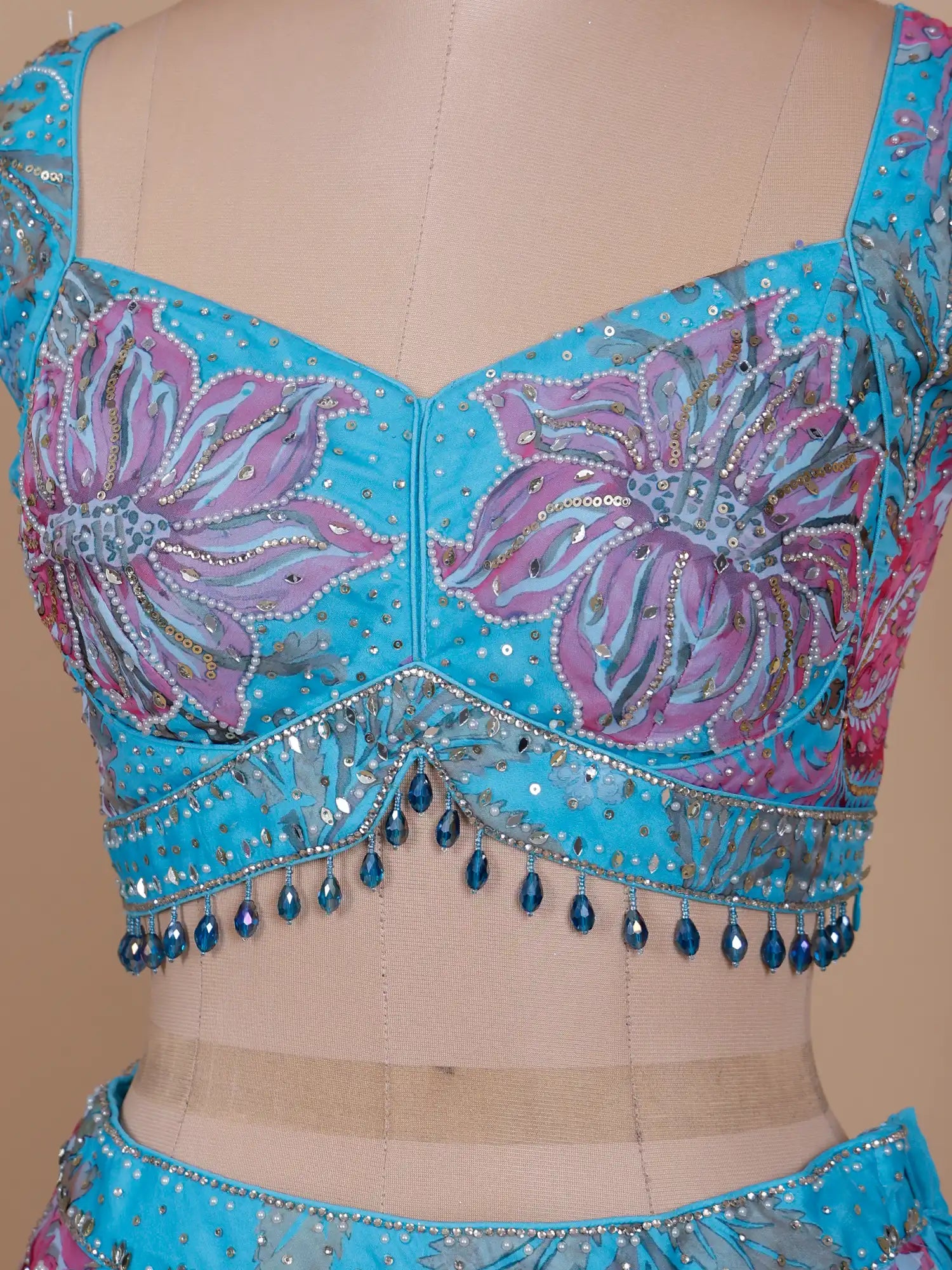 Get Sky Blue Couture Lehenga Enriched With Mirror Pearl Work