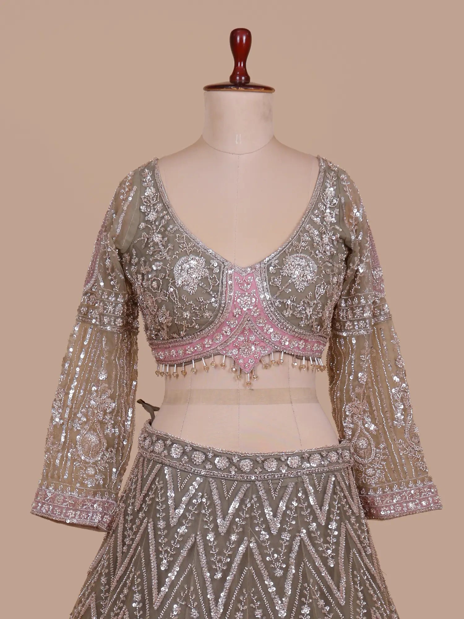 Get Mehendi Green Wedding Lehenga Featuring Applique Patch Detailing
