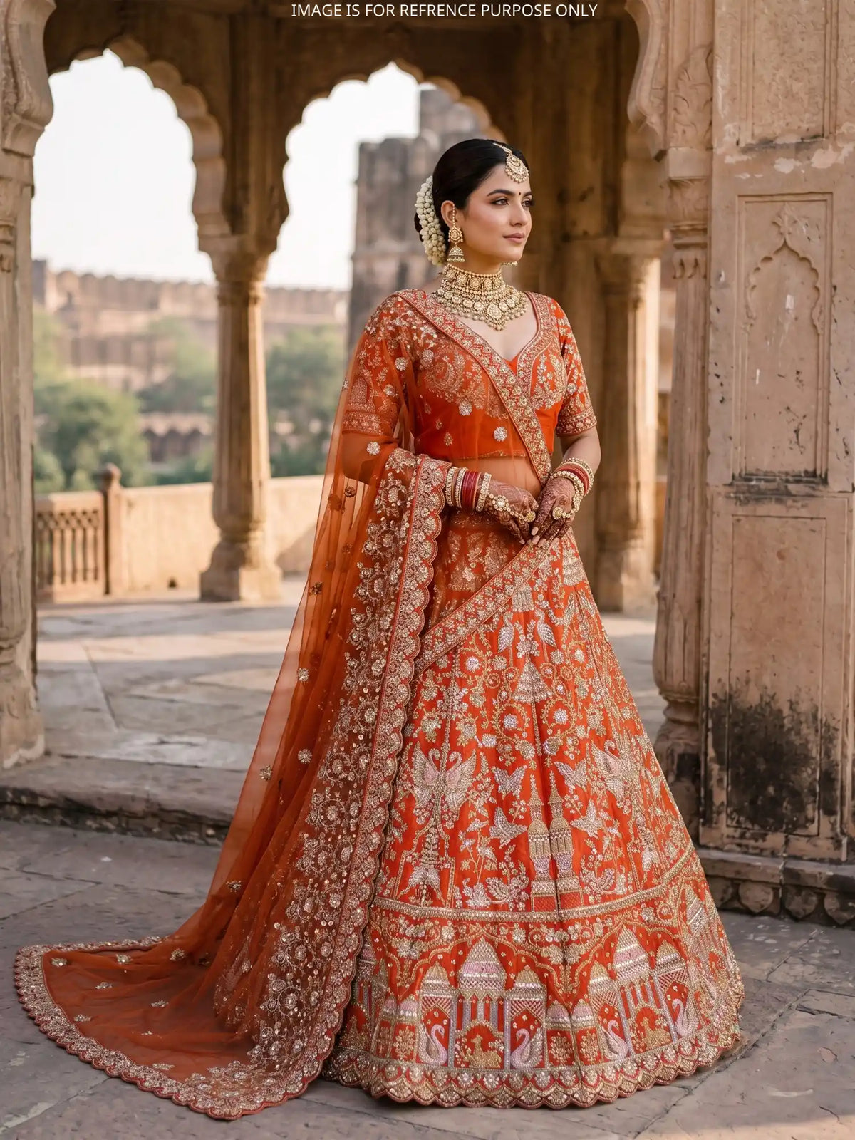 Exclusive Rust Orange Silk Lehenga Featuring Swans and Architectural Motifs