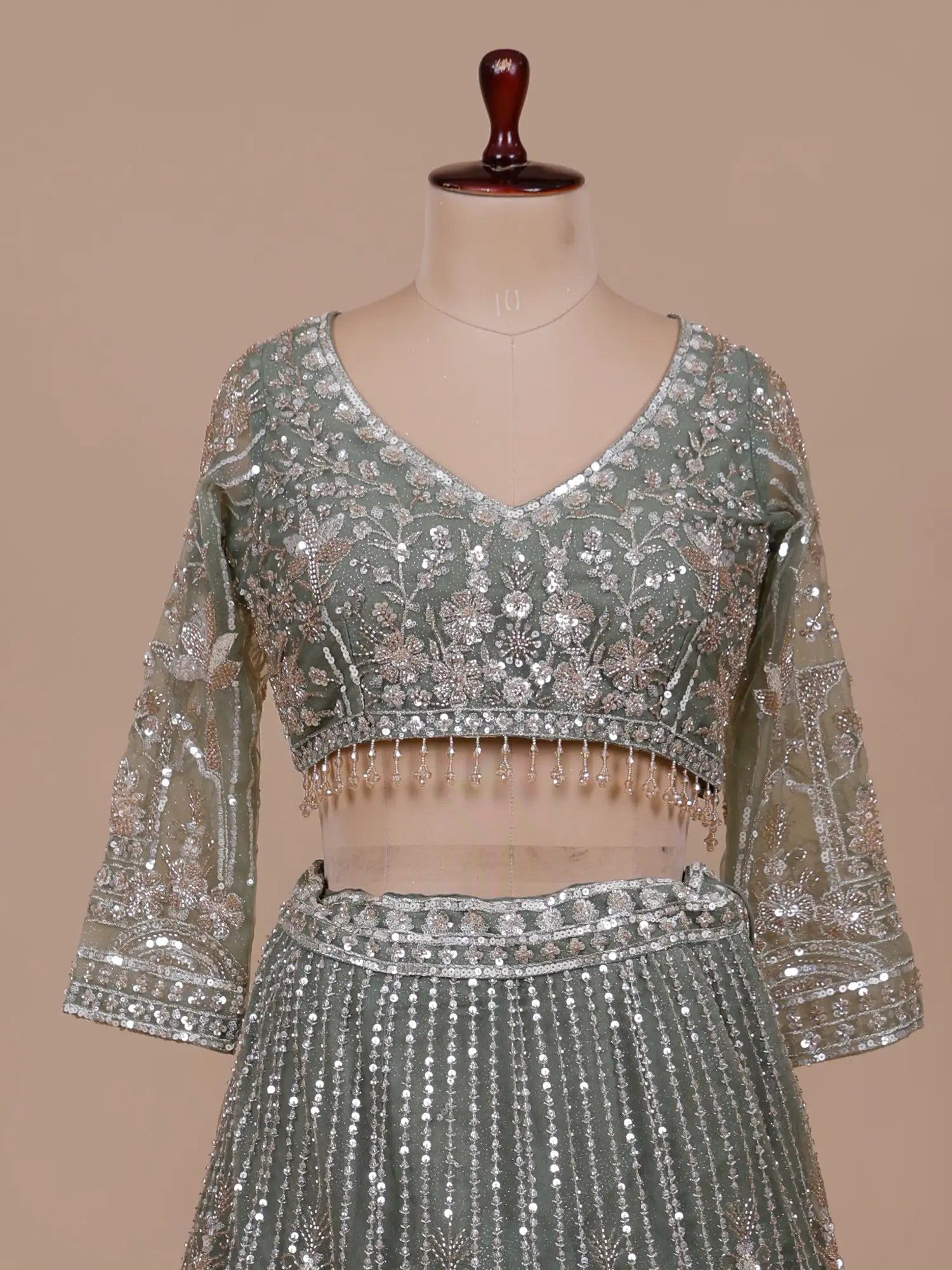 Trendy Sage Green Net Lehenga Set For Party And Wedding Wear