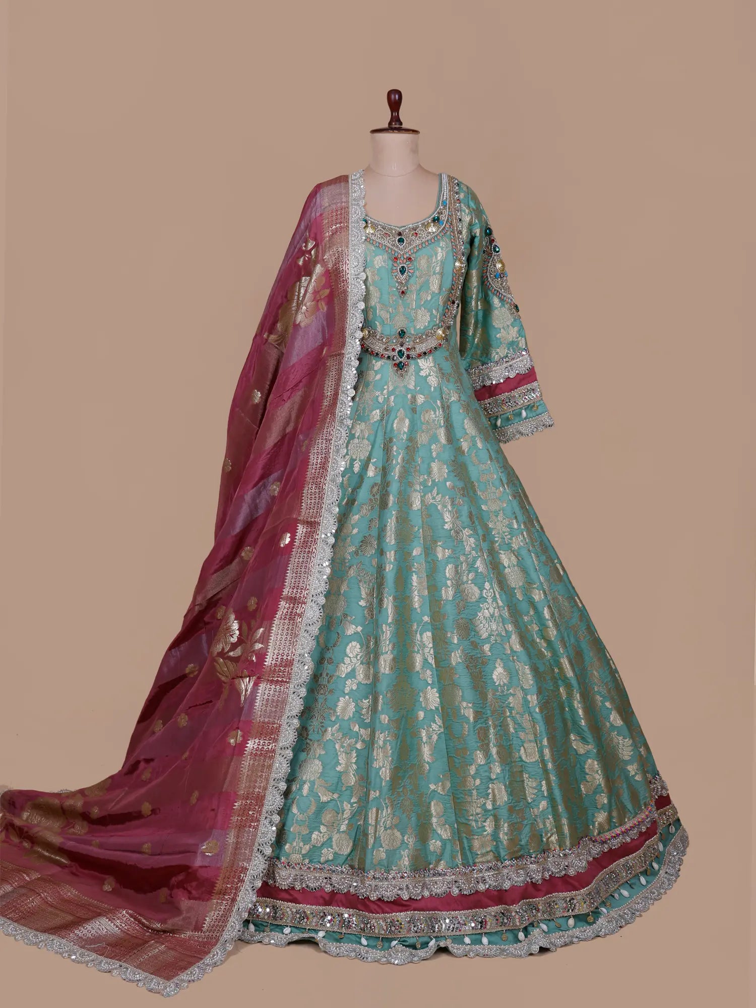 Magnificent Turquoise Blue Banarasi Silk Anarkali Gown Crafted for Grand Occasions