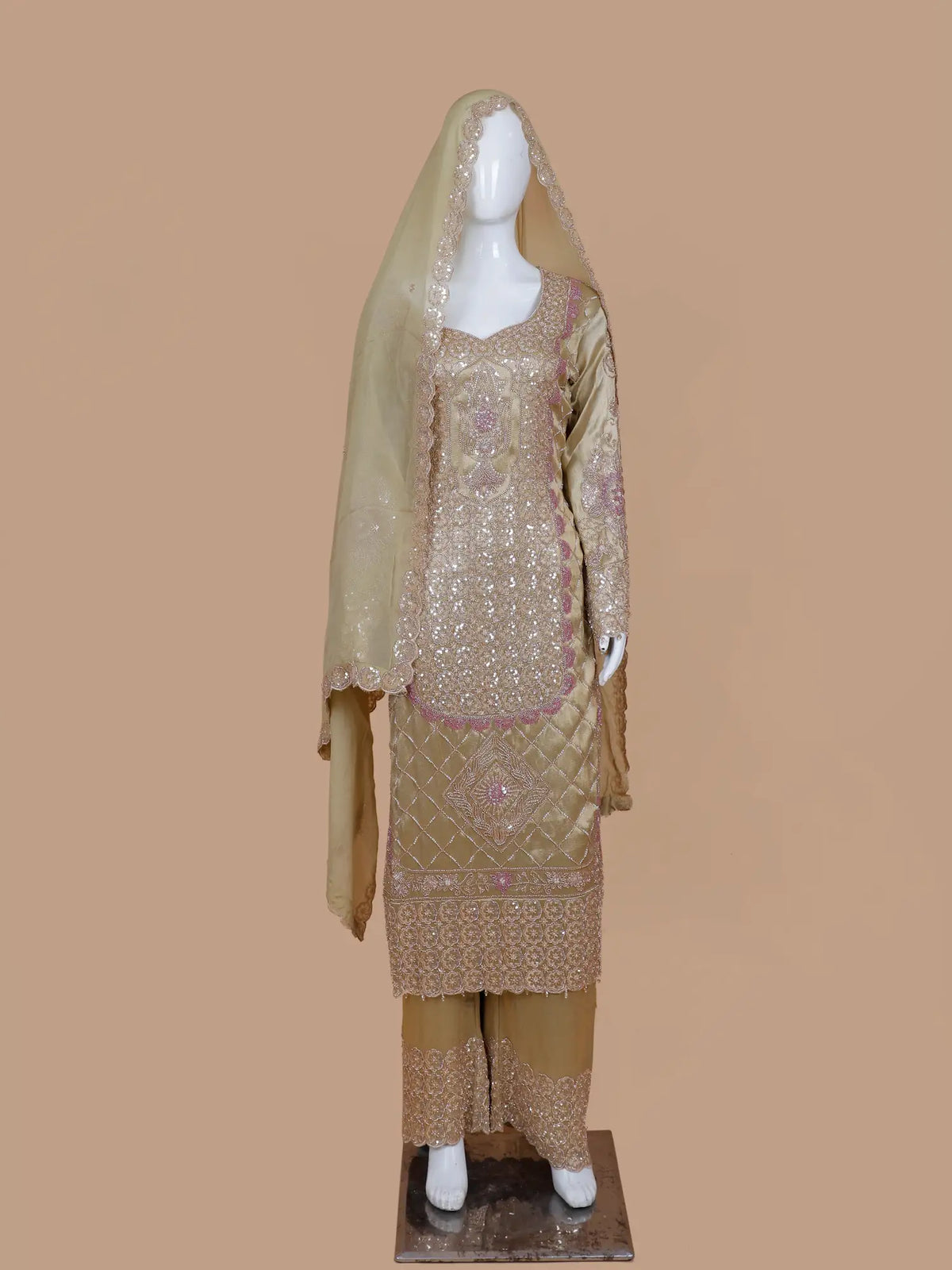 Striking Golden Shimmer Silk Designer Suit Featuring Contrast Pink Silver Work