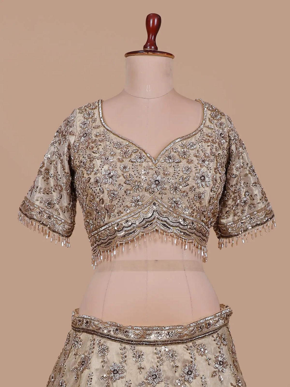 Glamorous Golden Shimmer Silk Lehenga with Silver Floral Embellishment