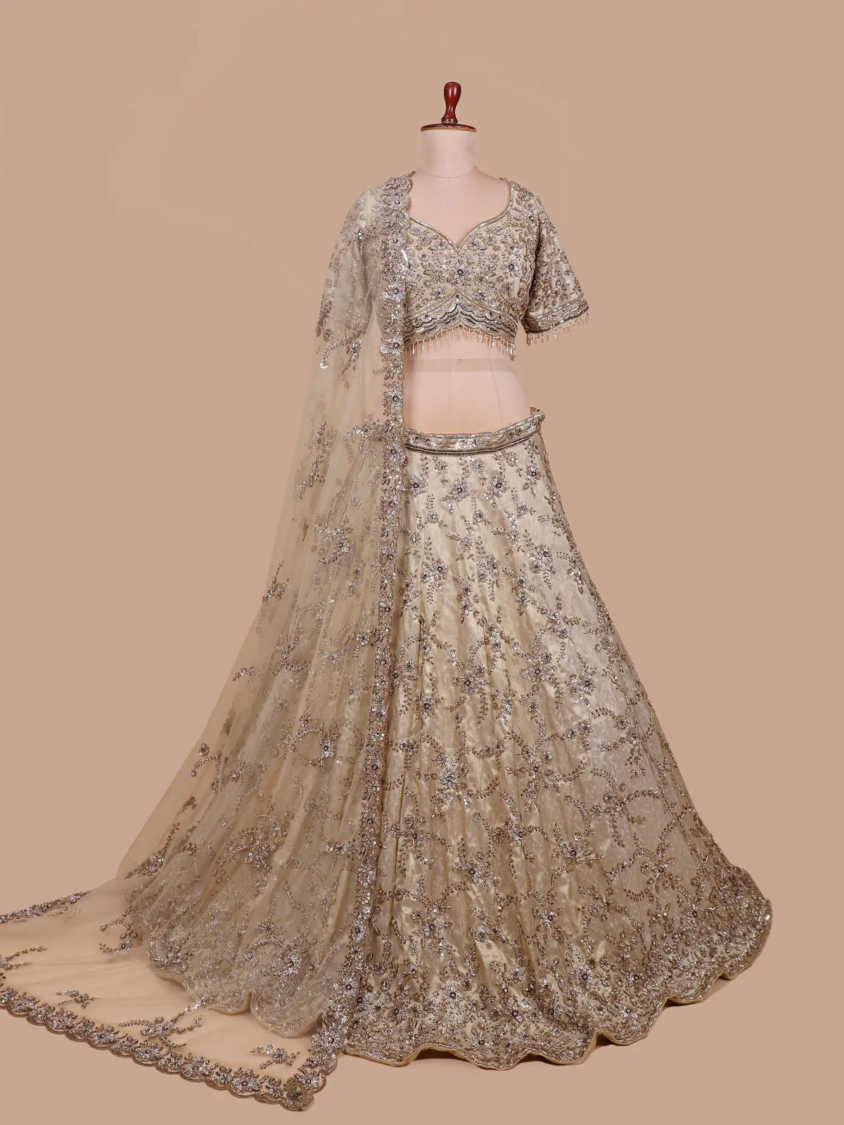 Glamorous Golden Shimmer Silk Lehenga with Silver Floral Embellishment