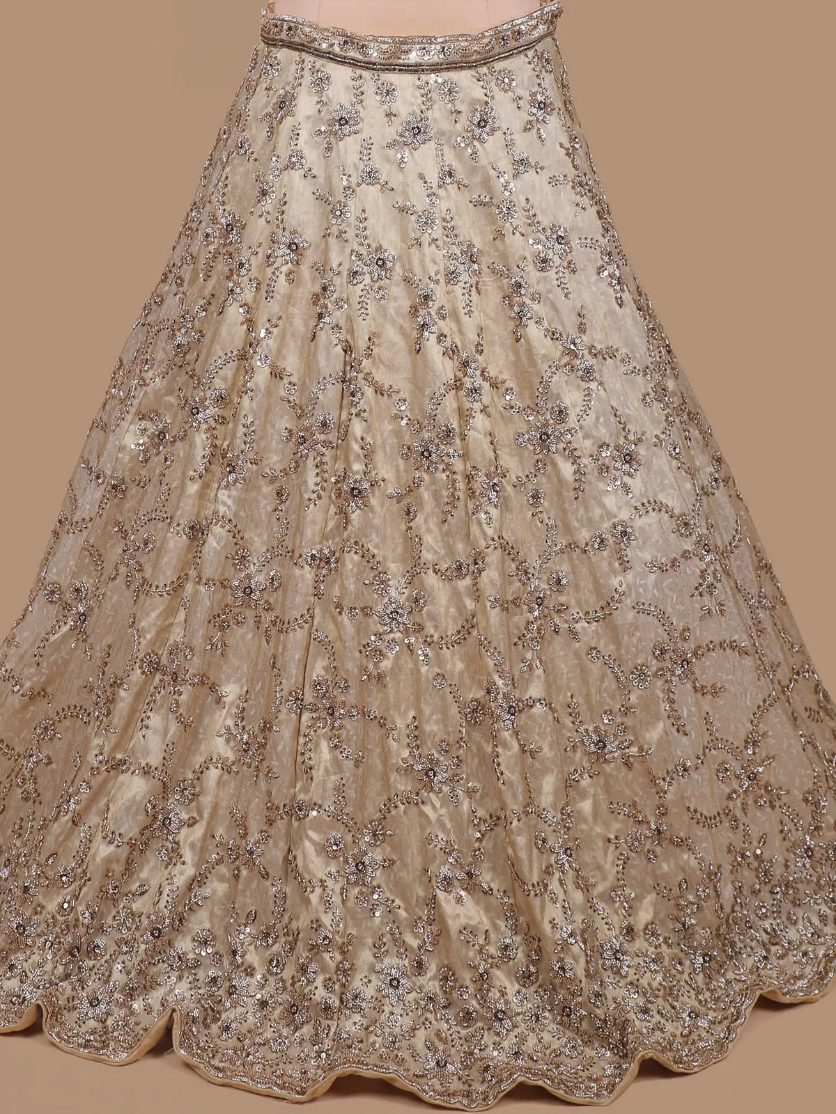 Glamorous Golden Shimmer Silk Lehenga with Silver Floral Embellishment