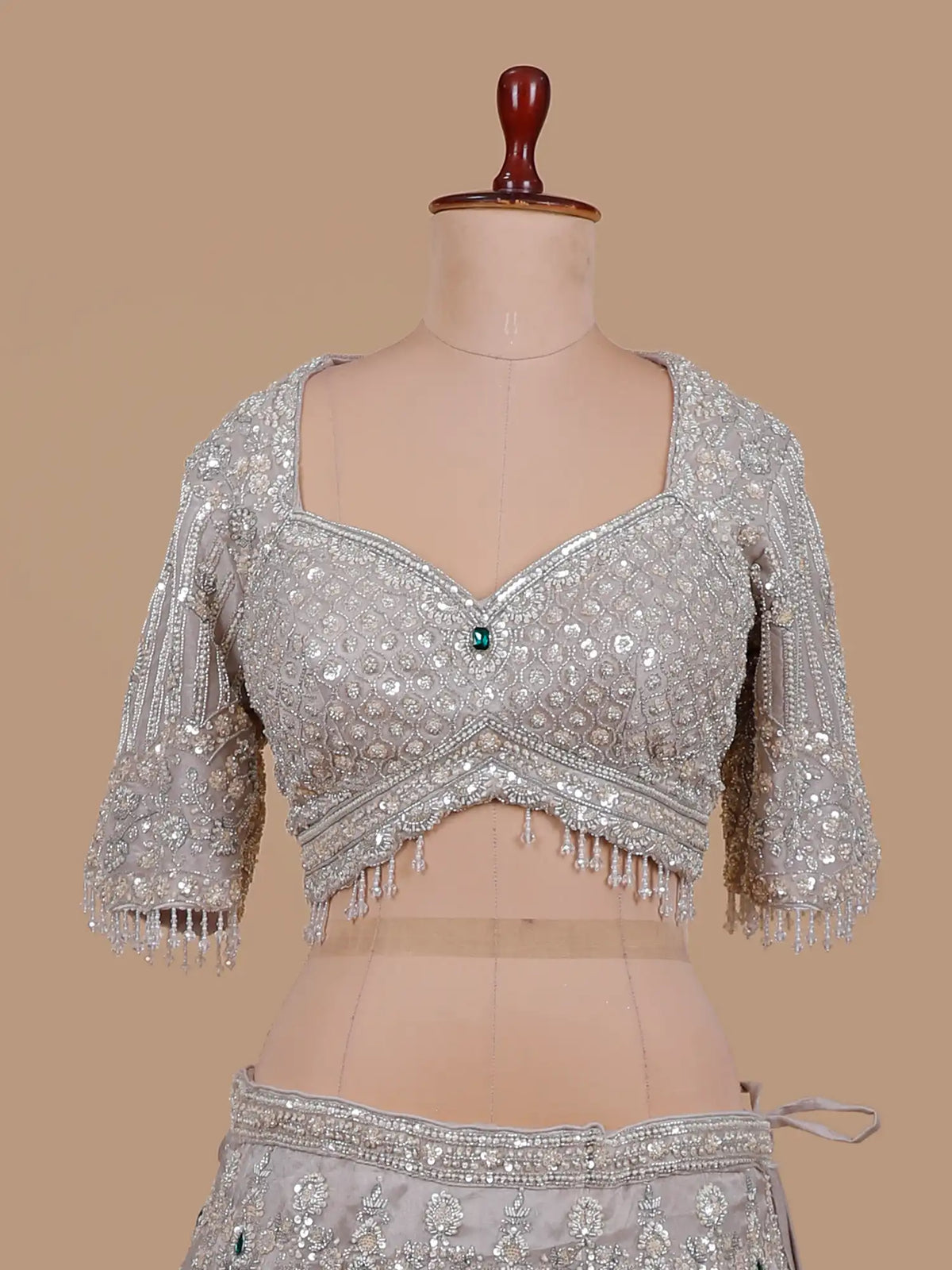 Buy Majestic Light Grey Designer Lehenga Online with Green Stone Highlights