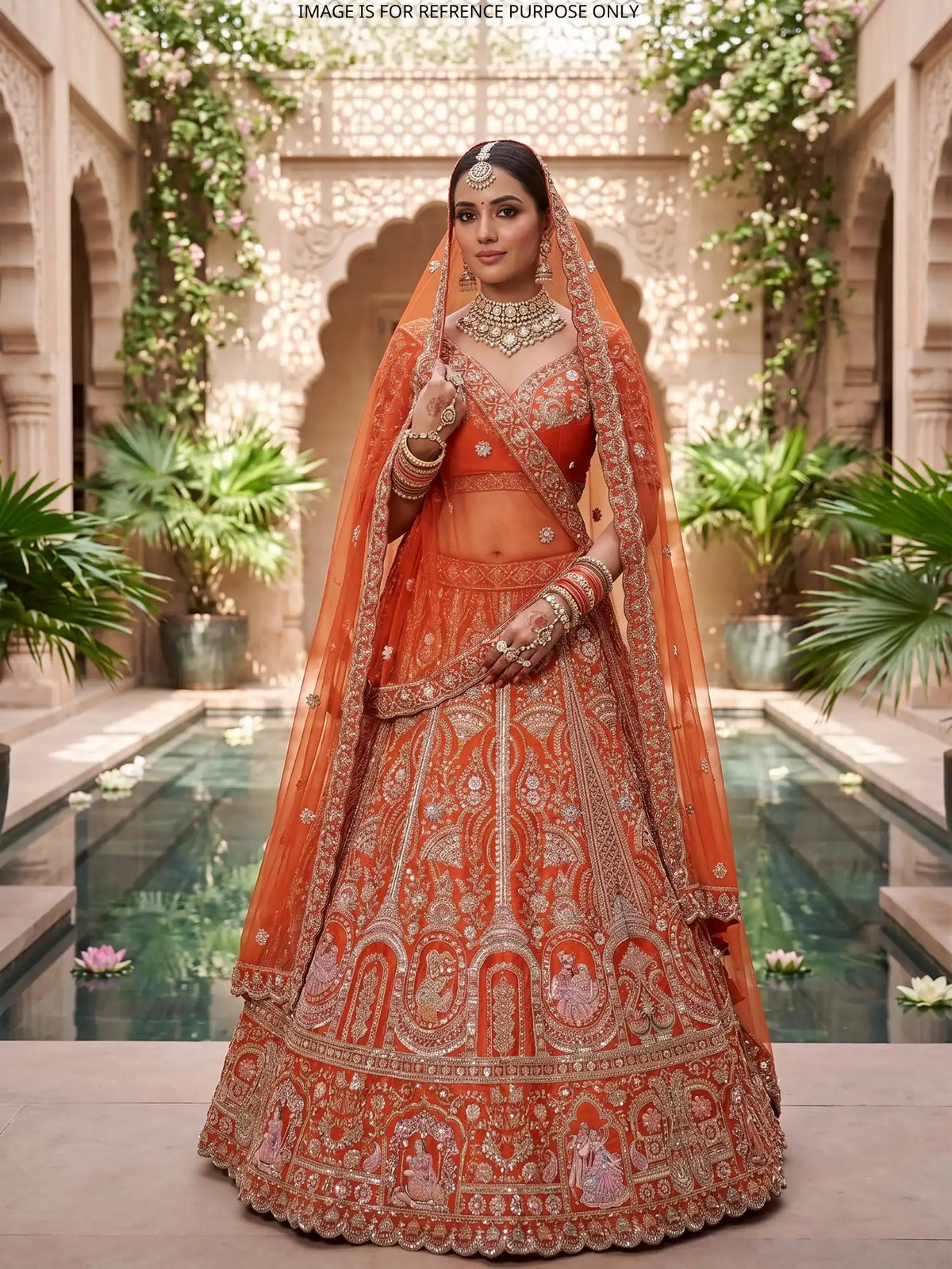 Handcrafted Rust Orange Bridal Lehenga with Wedding Couple Embroidery