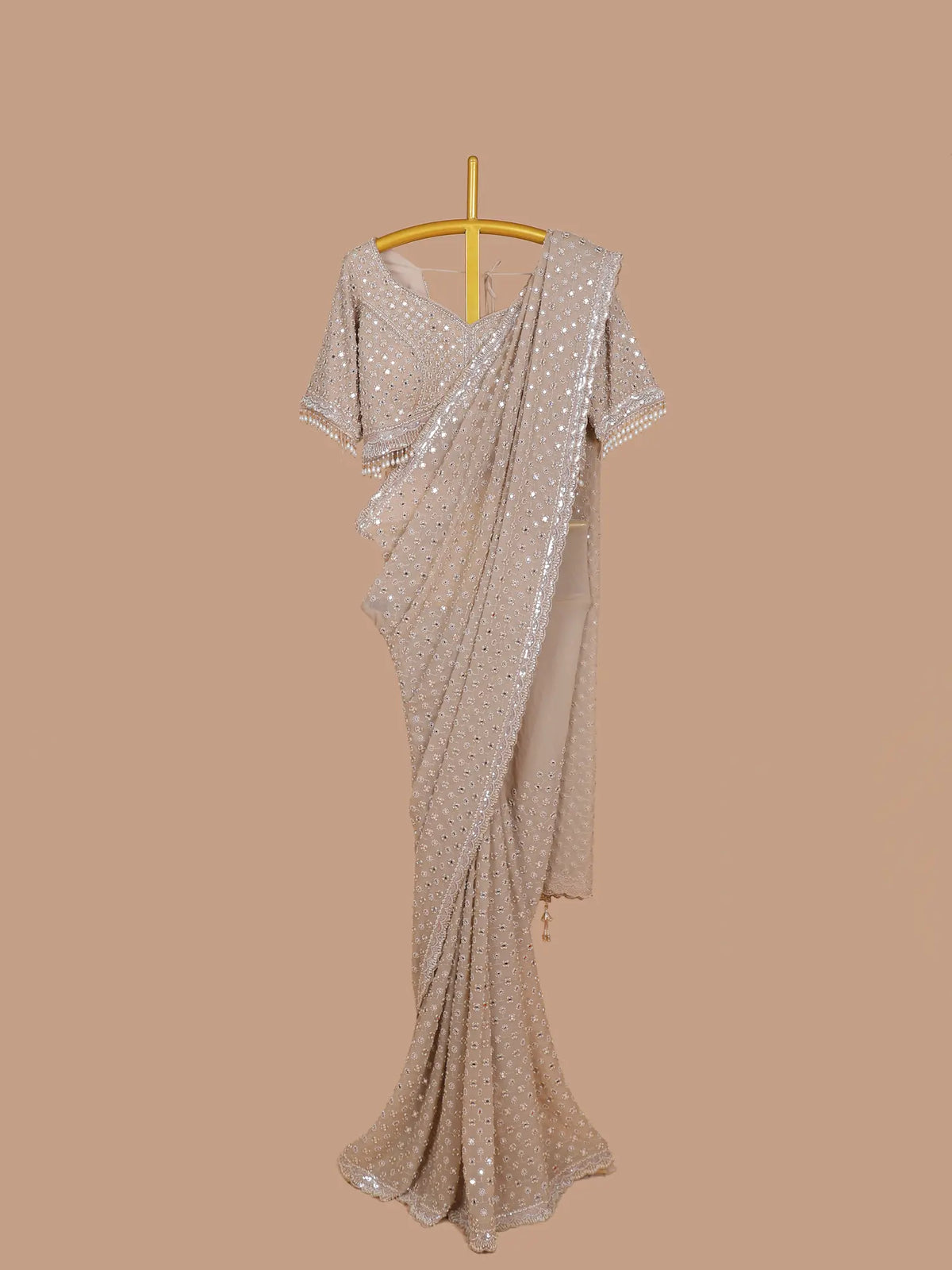 Ivory Party Wear Saree Featuring Mirror Sequins and Pearl Latkans