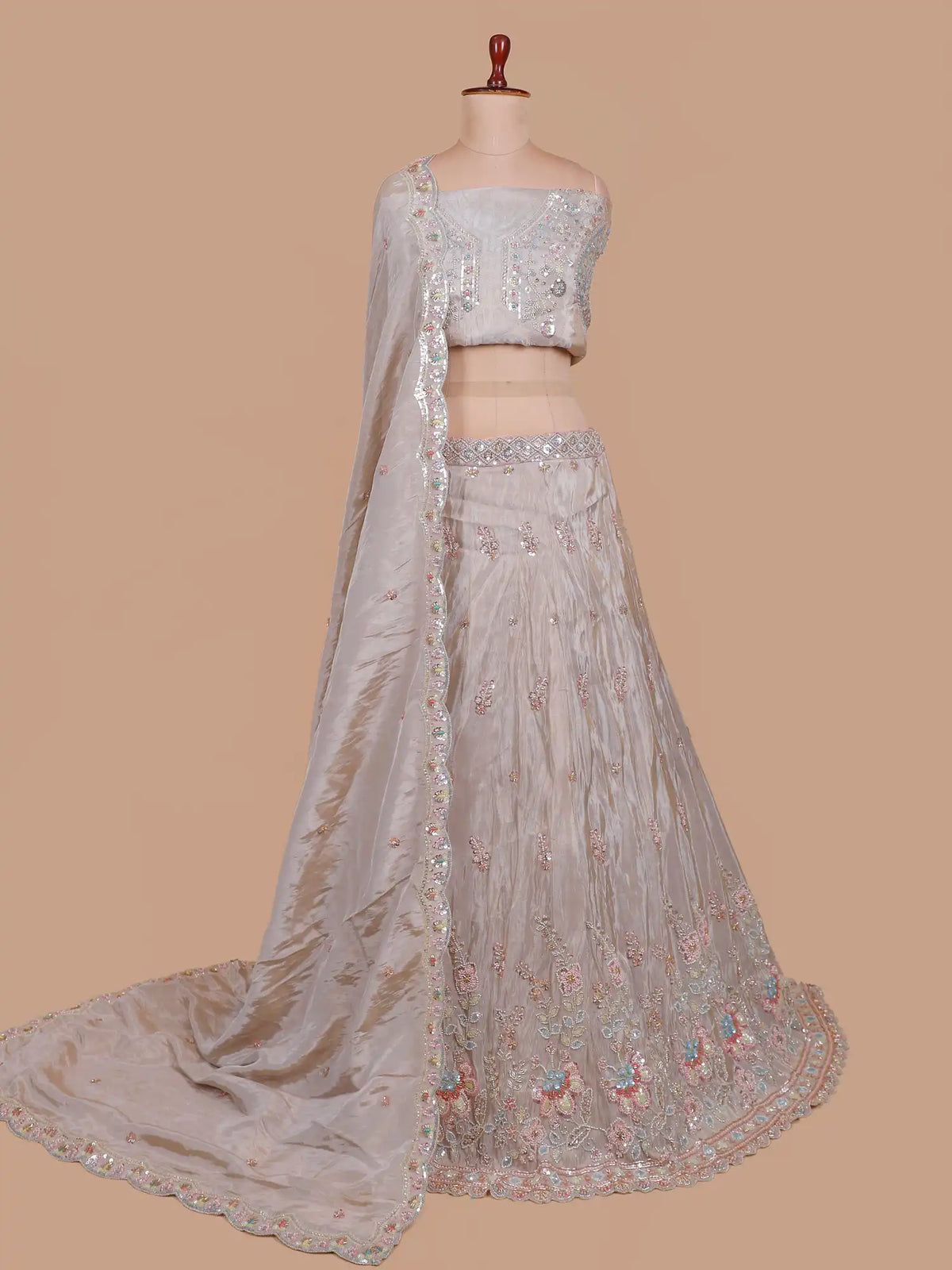 Light Beige Shimmer Organza Lehenga Featuring Pastel Floral Embroidery