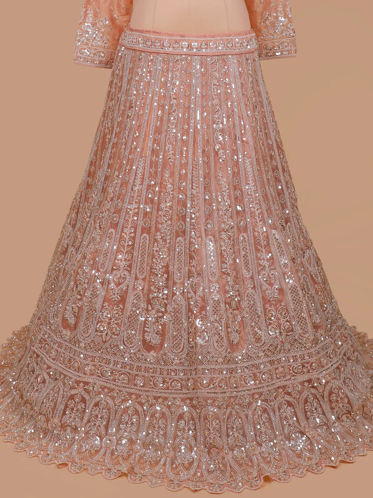 Light Peach Shimmer Organza Lehenga Featuring Silver Architectural  Embroidery