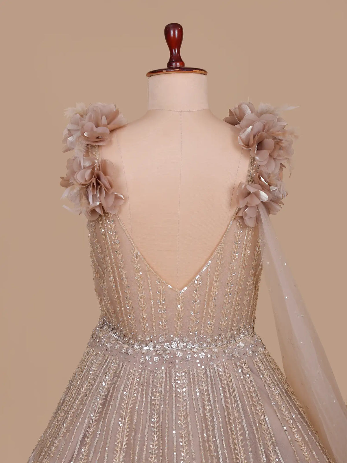 Discover Glamorous Champagne Net Long Gown With Sequin Floral Detailing