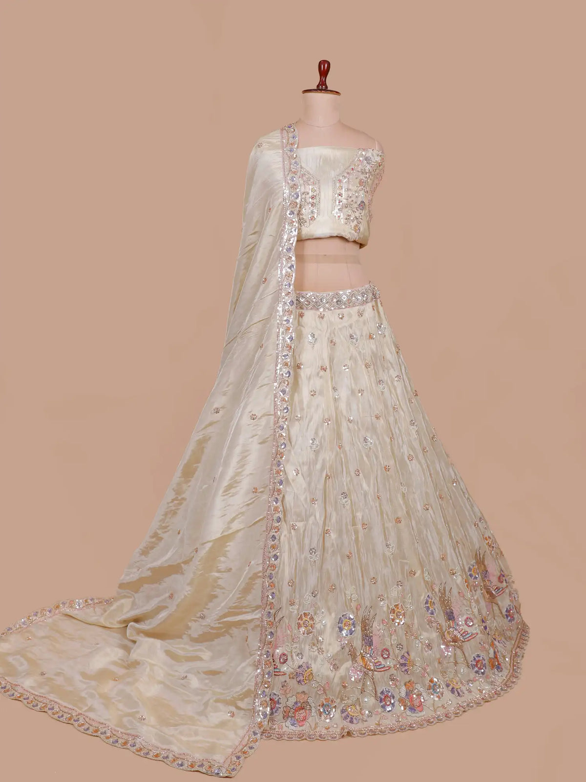 Champagne Gold Shimmer Organza Lehenga Featuring Colorful Bird Motifs