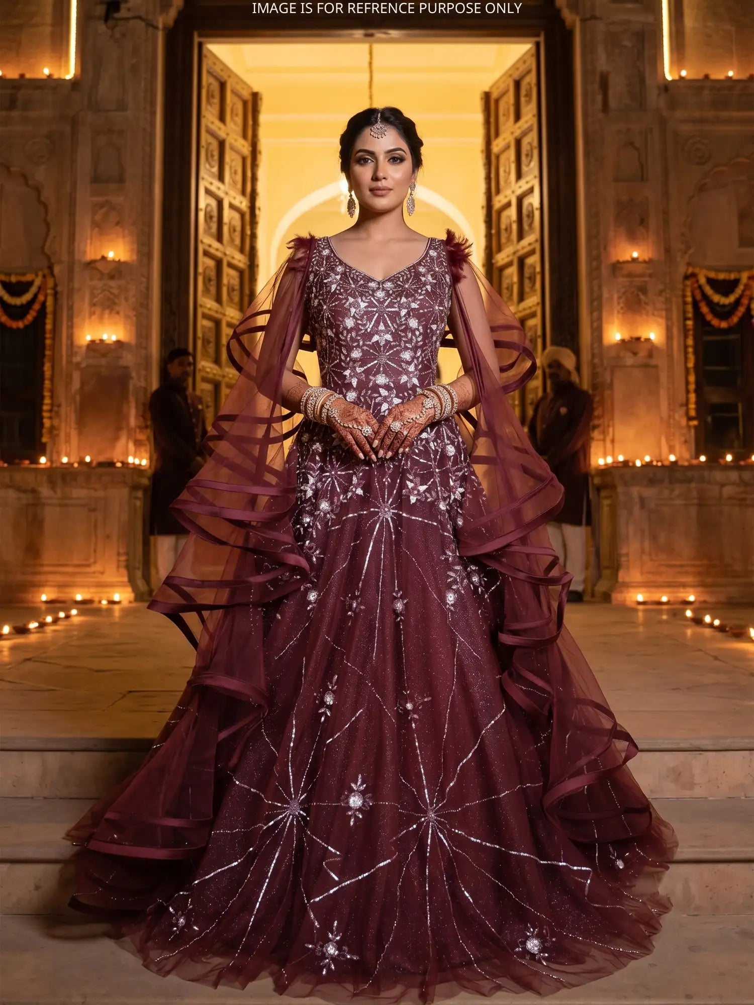 Luxury Maroon Long Couture Gown Accented By Feather And Diamond Work