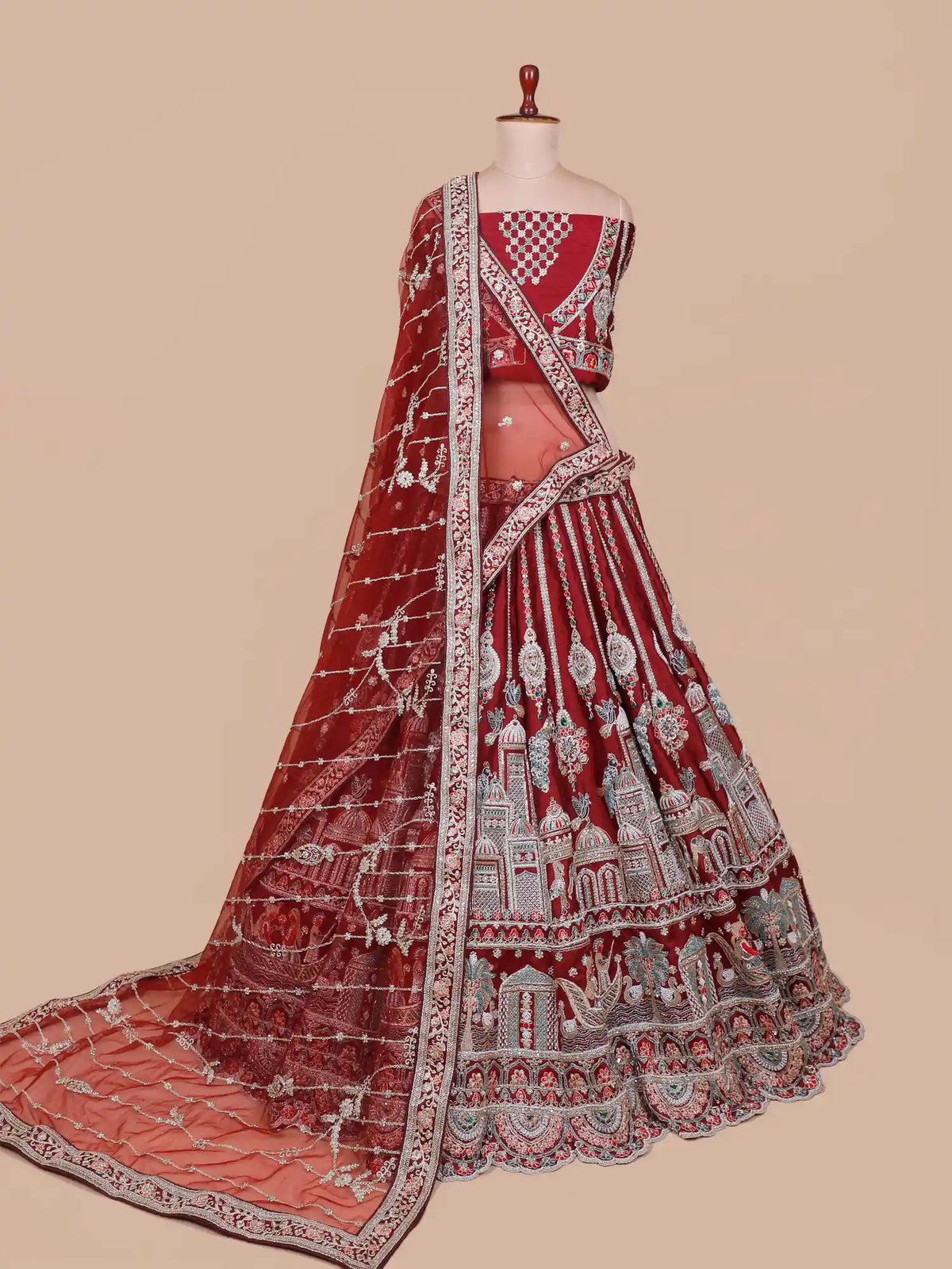 Majestic Maroon Silk Bridal Lehenga with Scenic Royal Palace Embroidery