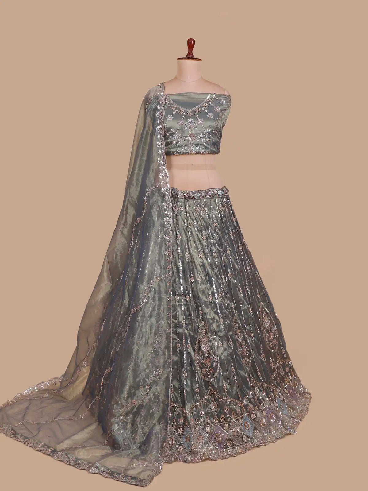 Dazzling Metallic Green Unstitched Lehenga with Floral Vine Embroidery