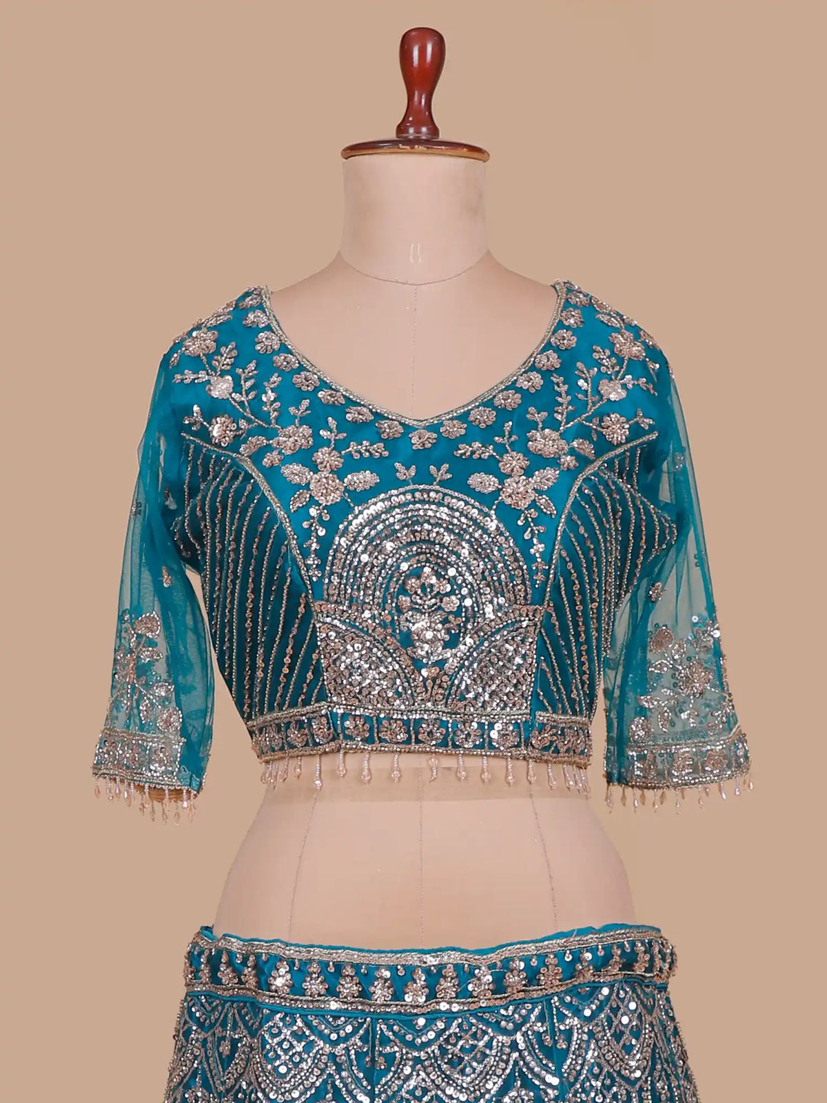 Peacock Blue Net Designer Lehenga Embellished in Metallic Sequin and Bead Detailing