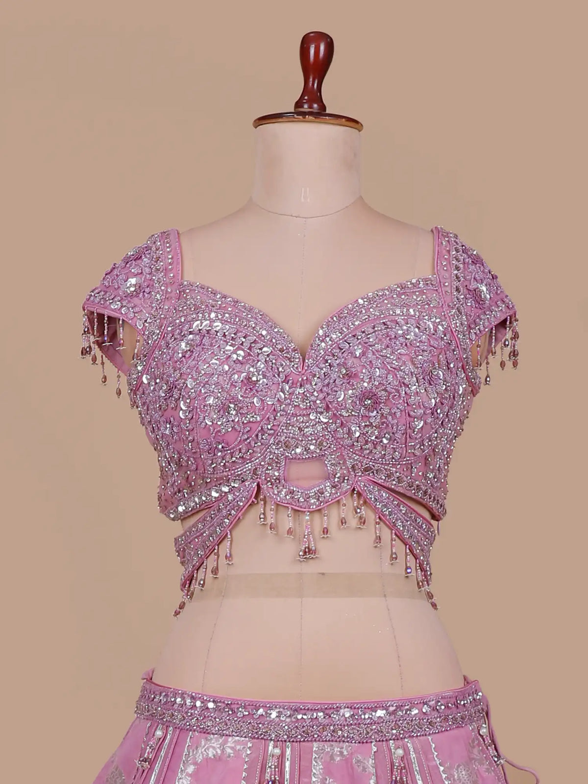 Luxury Pink Silk Lehenga with Statement Cutout Blouse and Crystal Tassels