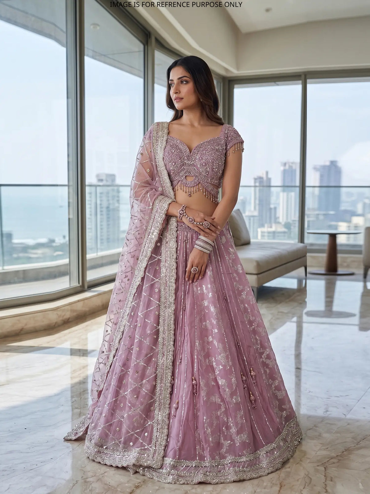 Luxury Pink Silk Lehenga with Statement Cutout Blouse and Crystal Tassels