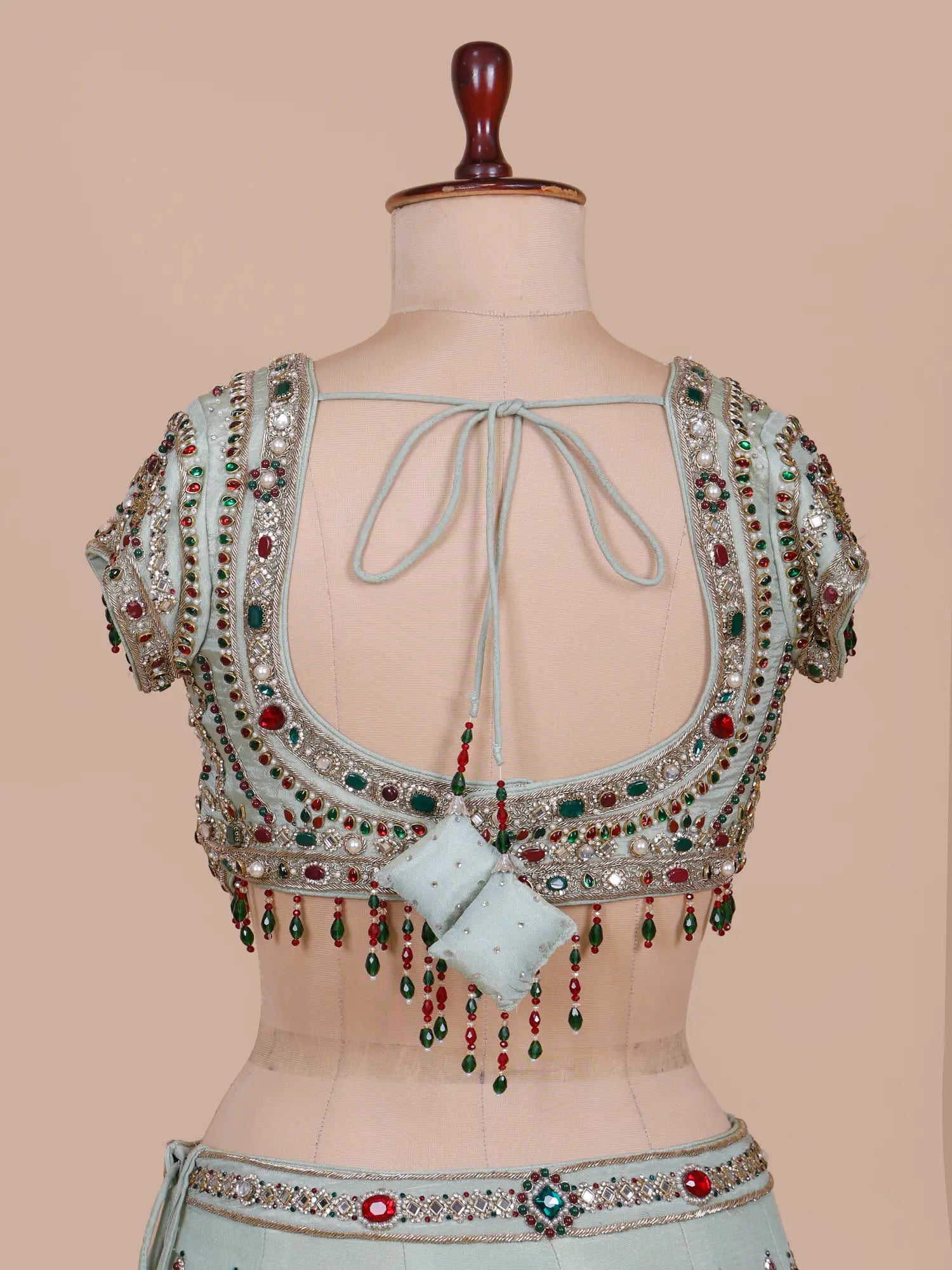 Shop Pista Green Shimmer Silk Lehenga Online With Crystal Brooch Detailing