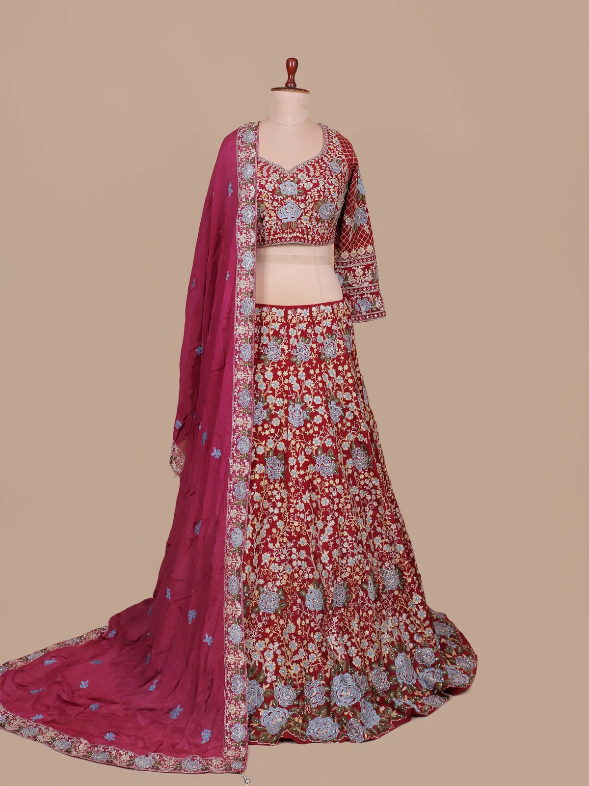 Eye Catching Maroon Georgette Lehenga Choli With Blue Rose Floral Design