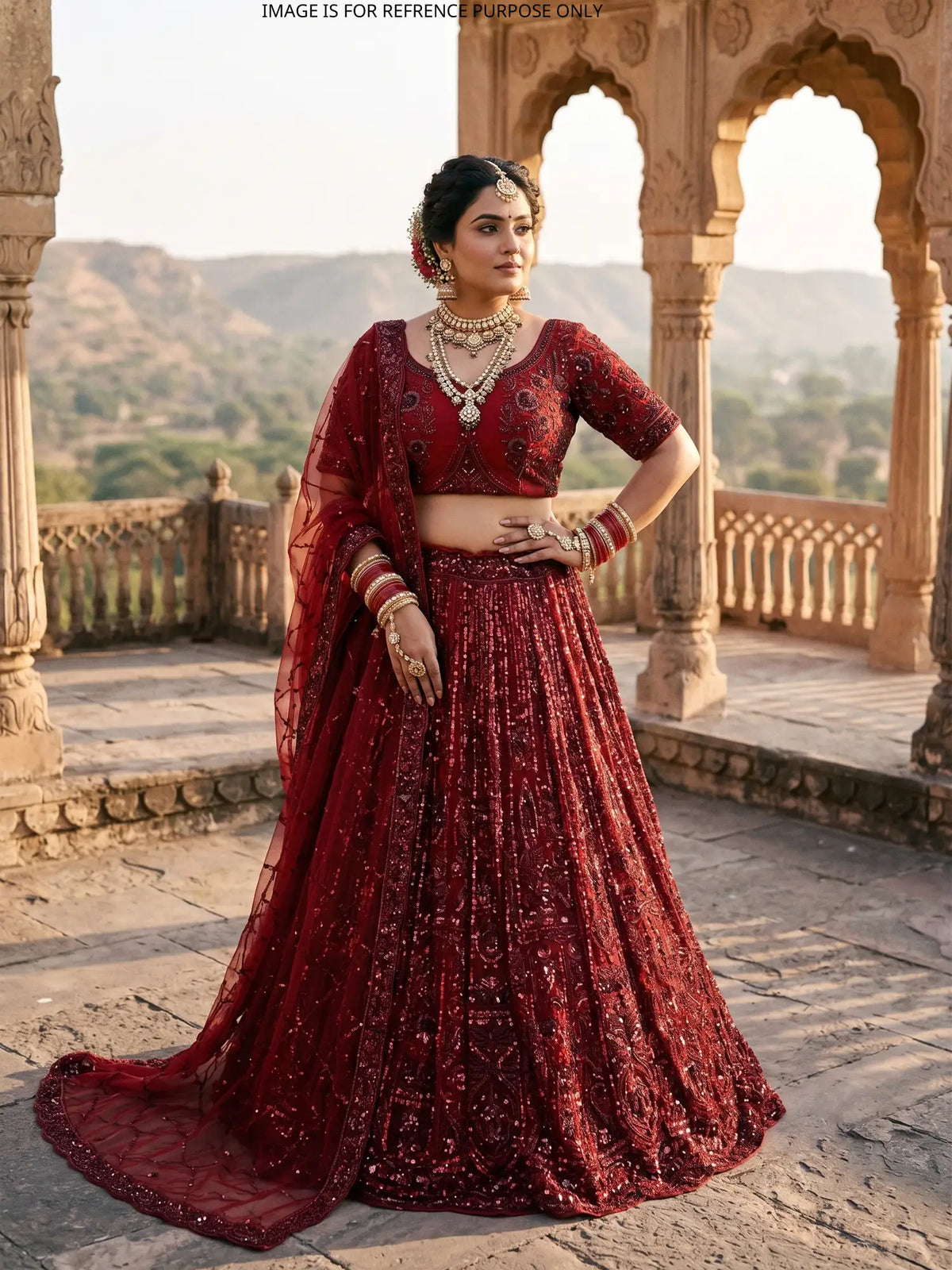 Maroon Silk Net Lehenga Featuring Heavy Sequin Panel Work