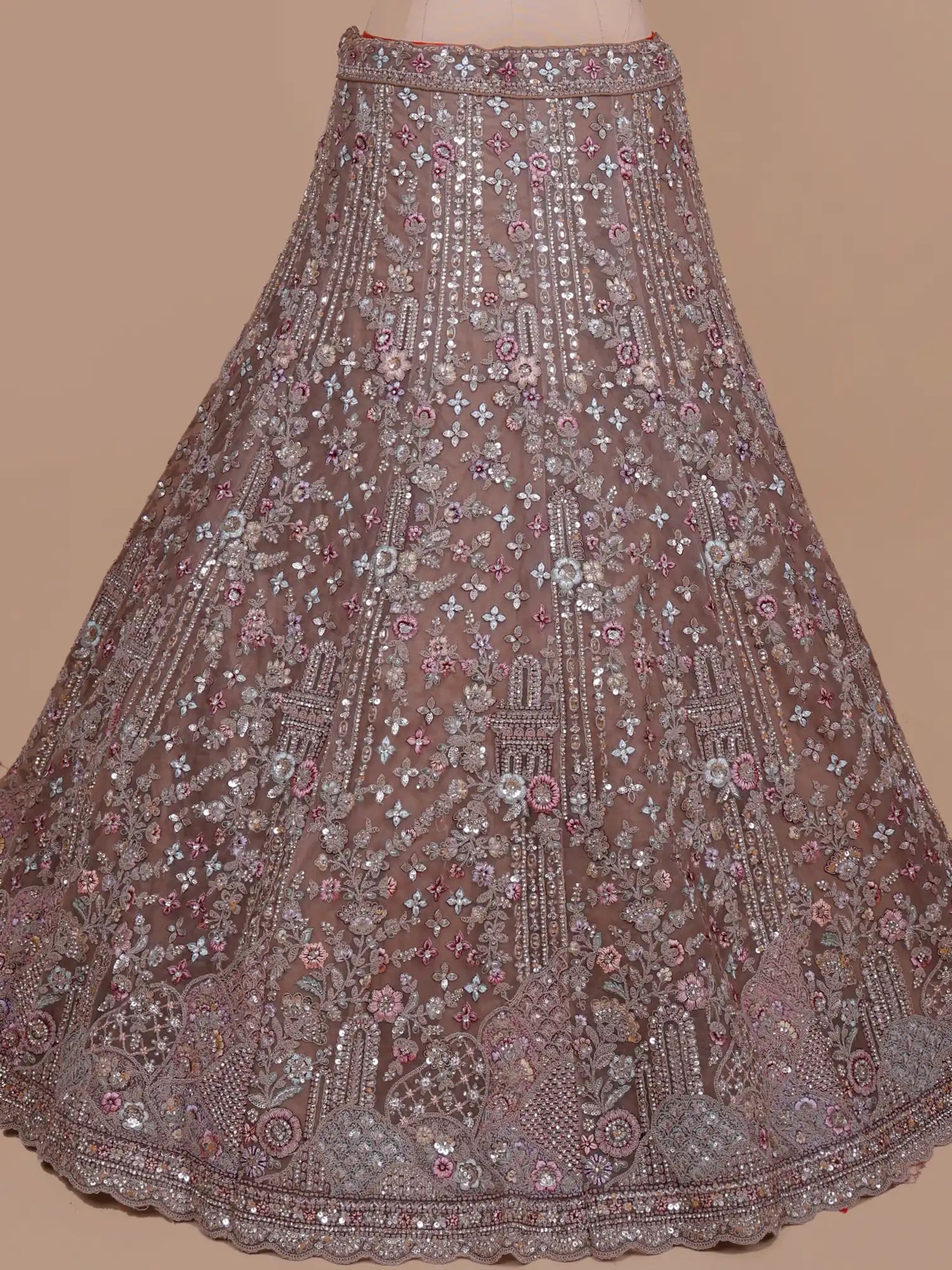 Get Chickoo Net Unstitched Lehenga With Multi Thread Floral Sequin Detailing