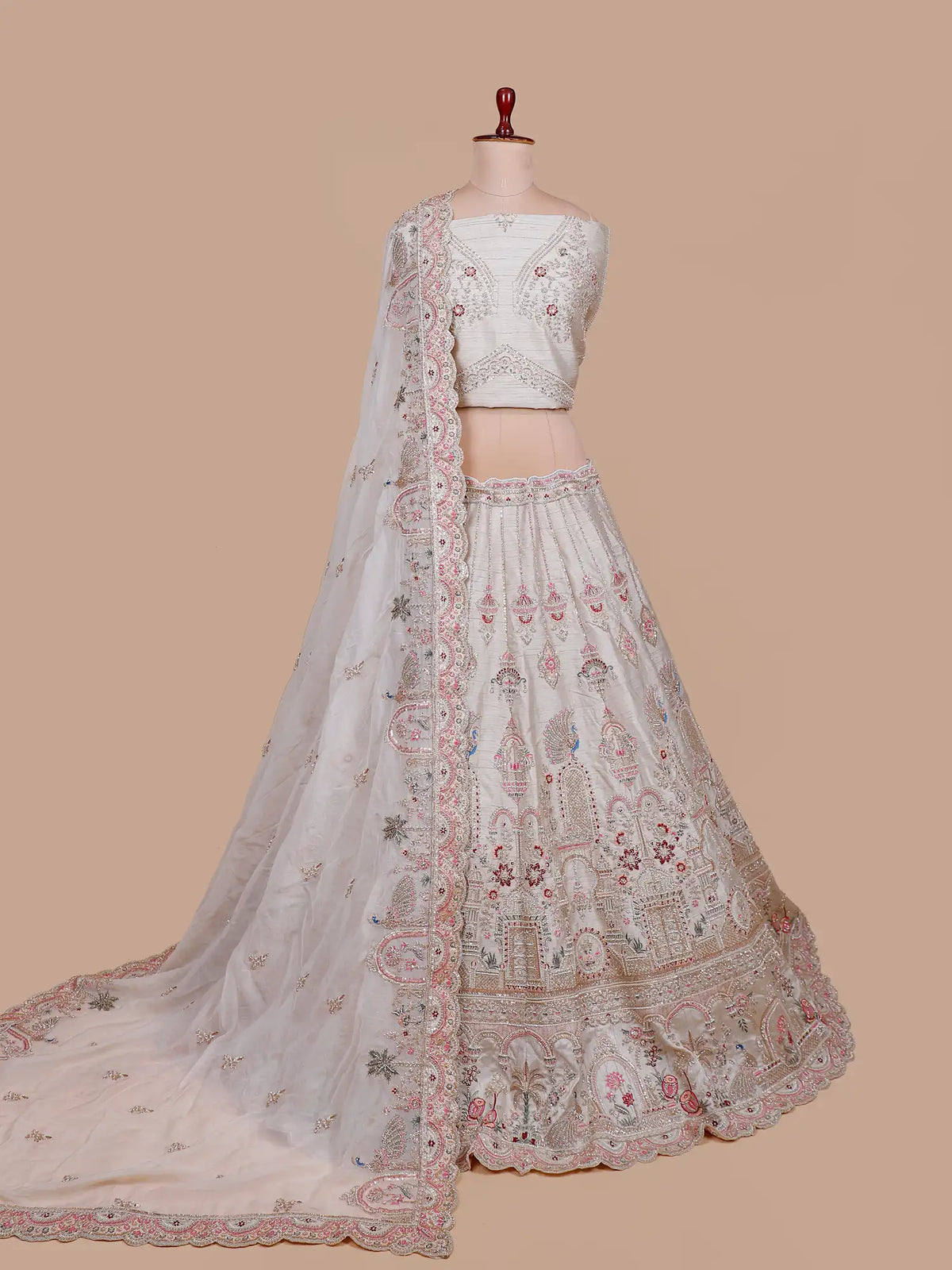 Grand Off White Silk Lehenga with Royal Arches and Peacock Embroidery