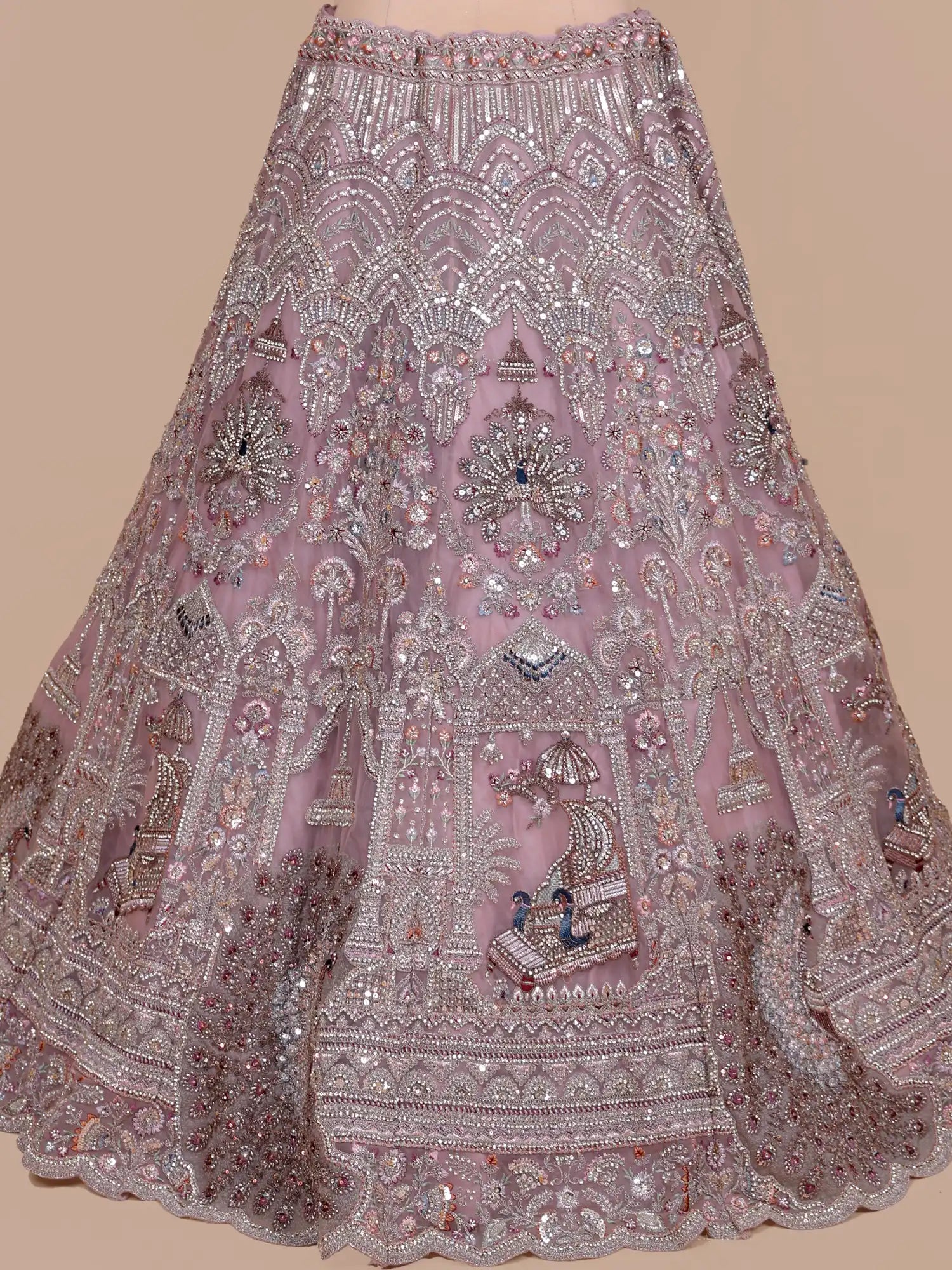 Onion Pink Designer Unstitched Net Lehenga Showcasing Ornate Peacock Threadwork