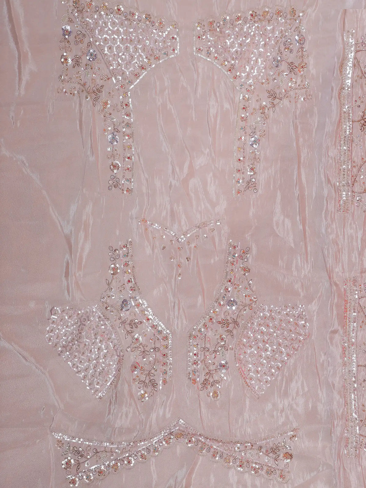 Pastel Pink Shimmer Organza Lehenga Showcasing Peacock Artistry