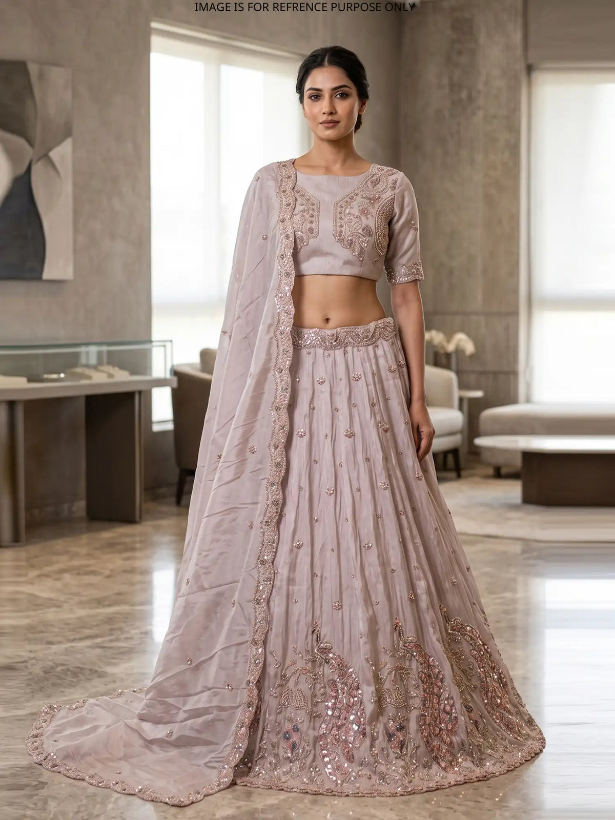 Pastel Pink Shimmer Organza Lehenga Showcasing Peacock Artistry