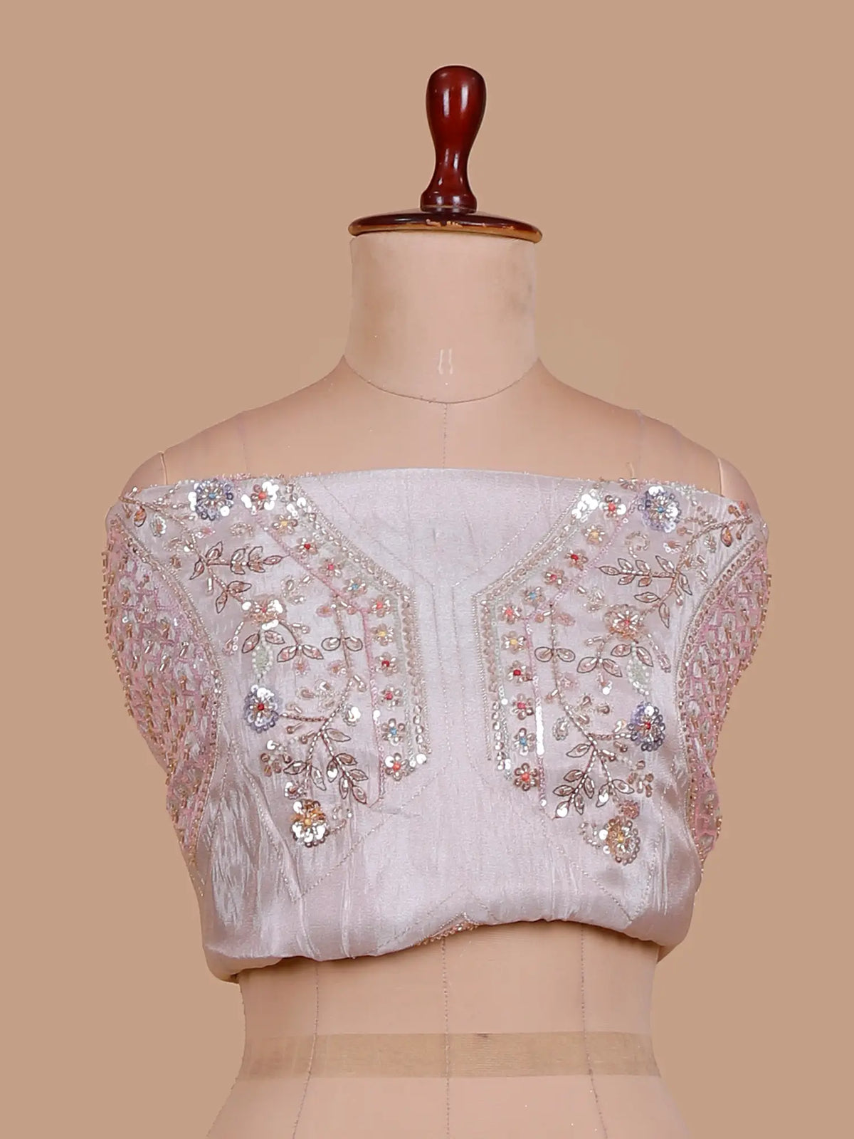 Pastel Pink Shimmer Organza Lehenga Showcasing Peacock Artistry