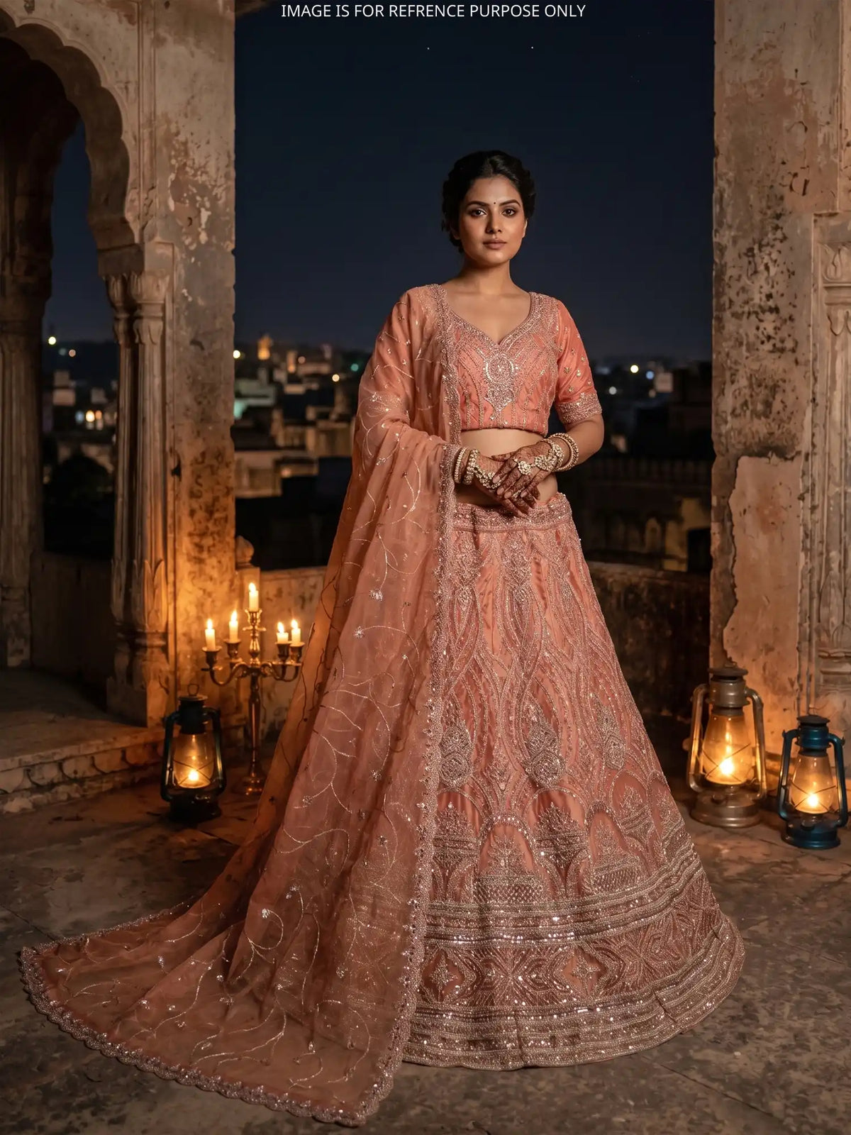 Peach Shimmer Organza Lehenga with Ornate Silver Thread Patterns