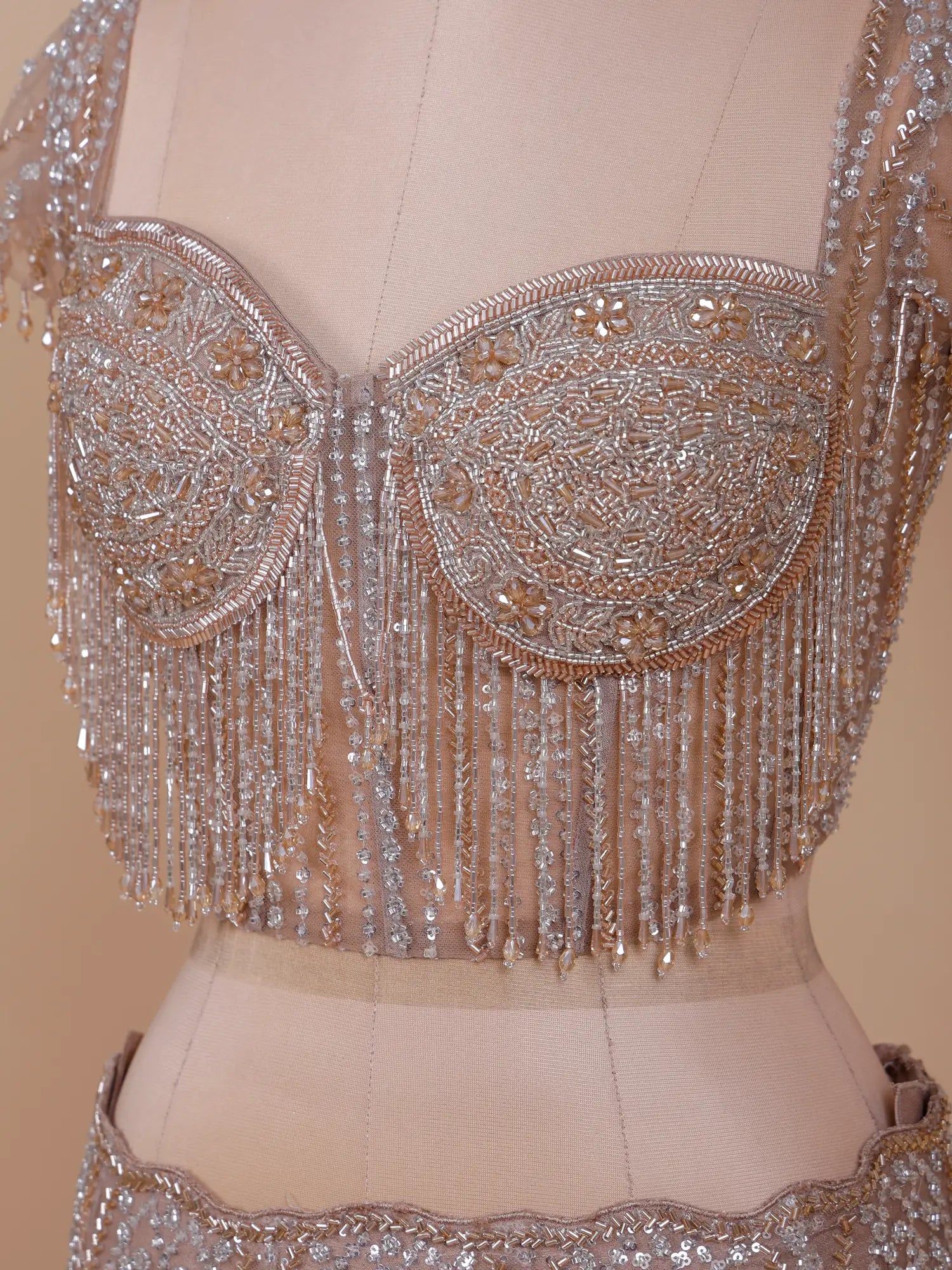 Premium Chickoo Net Designer Mermaid Lehenga Enhanced With Crystal Work