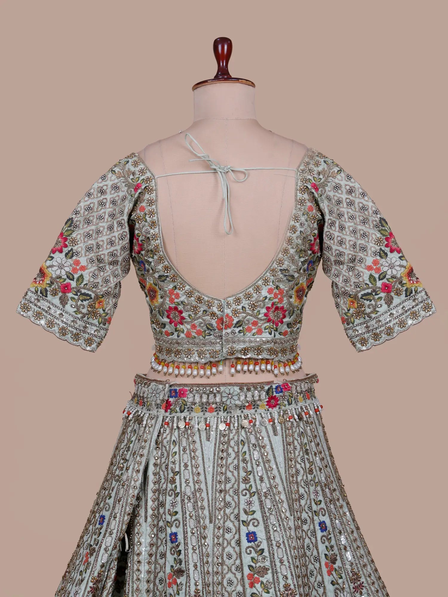 Pista Green Silk Designer Lehenga Covered In Floral Thread Embroidery