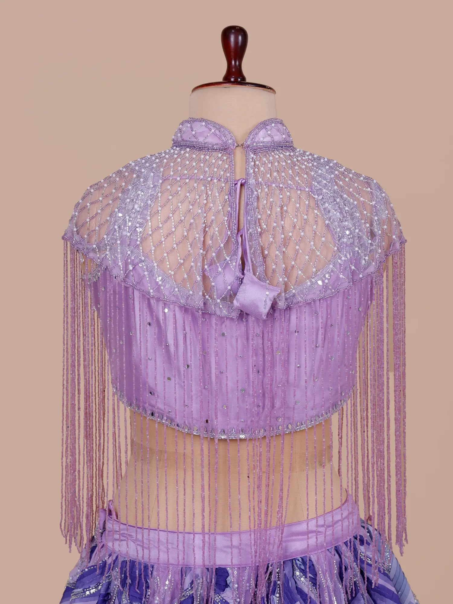 Stylish Lavender Net Lehenga Choli With Pearl Work