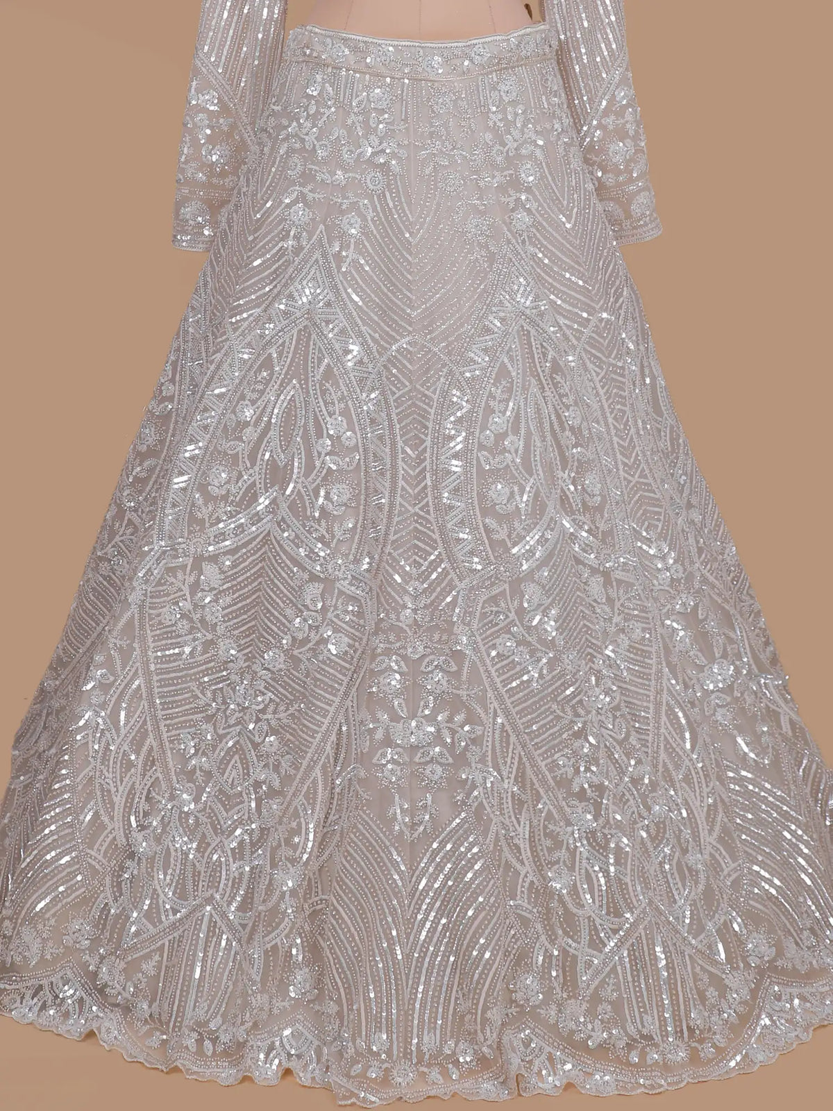 Off-White Net Lehenga Featuring Intricate Silver Embroidery