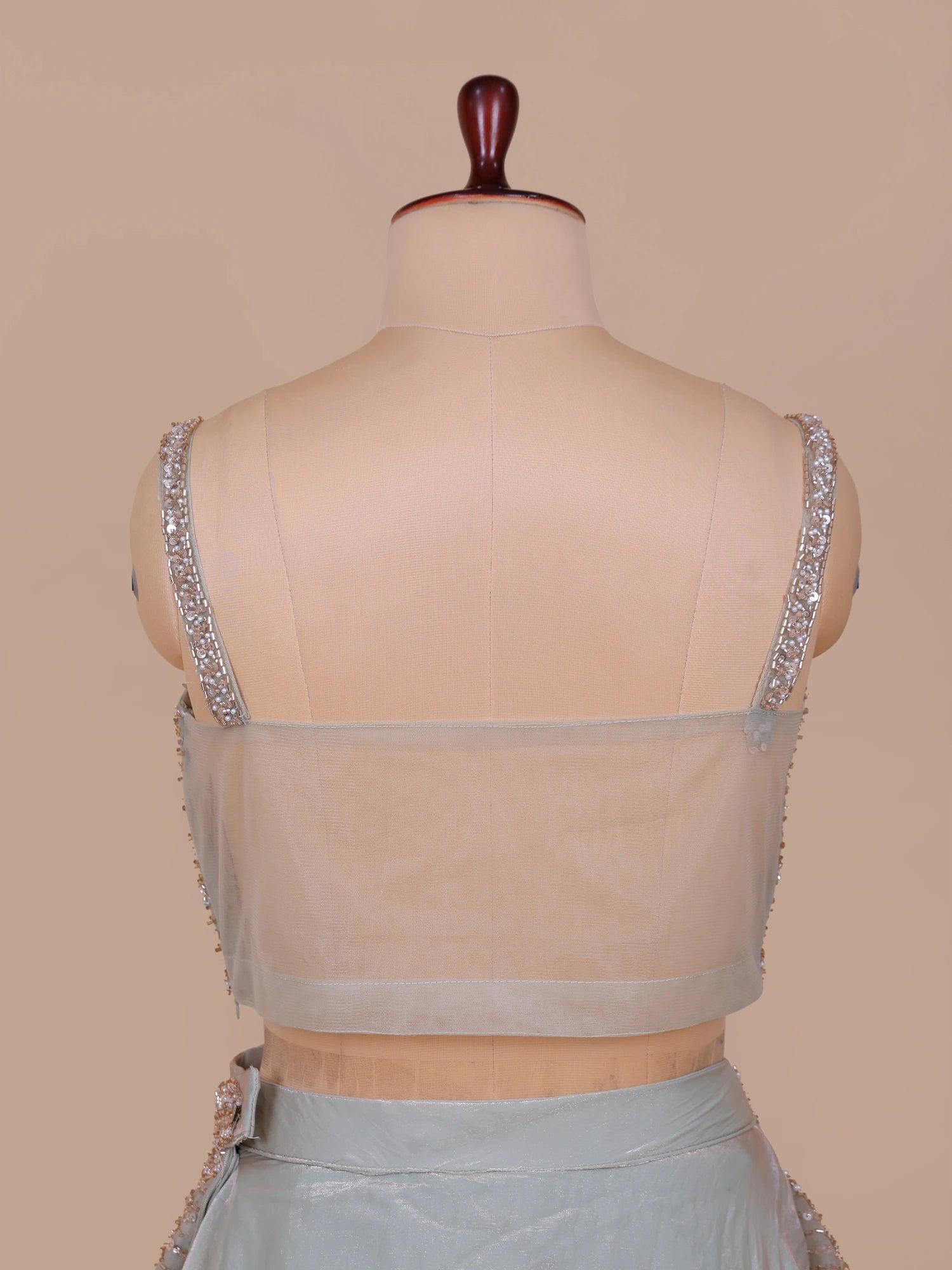 Get Designer Pastel Green Organza Lehenga With Sequins Work