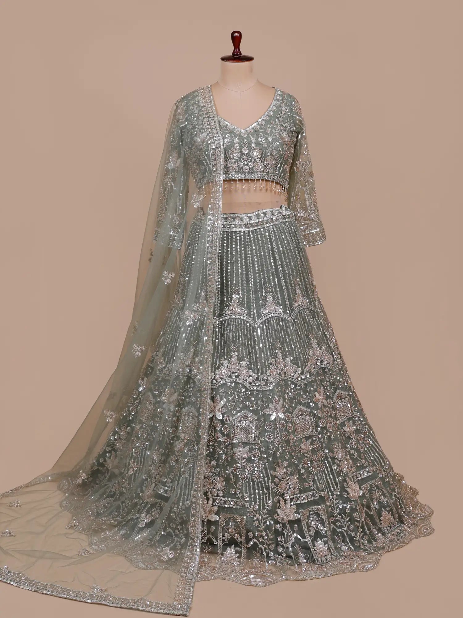 Trendy Sage Green Net Lehenga Set For Party And Wedding Wear