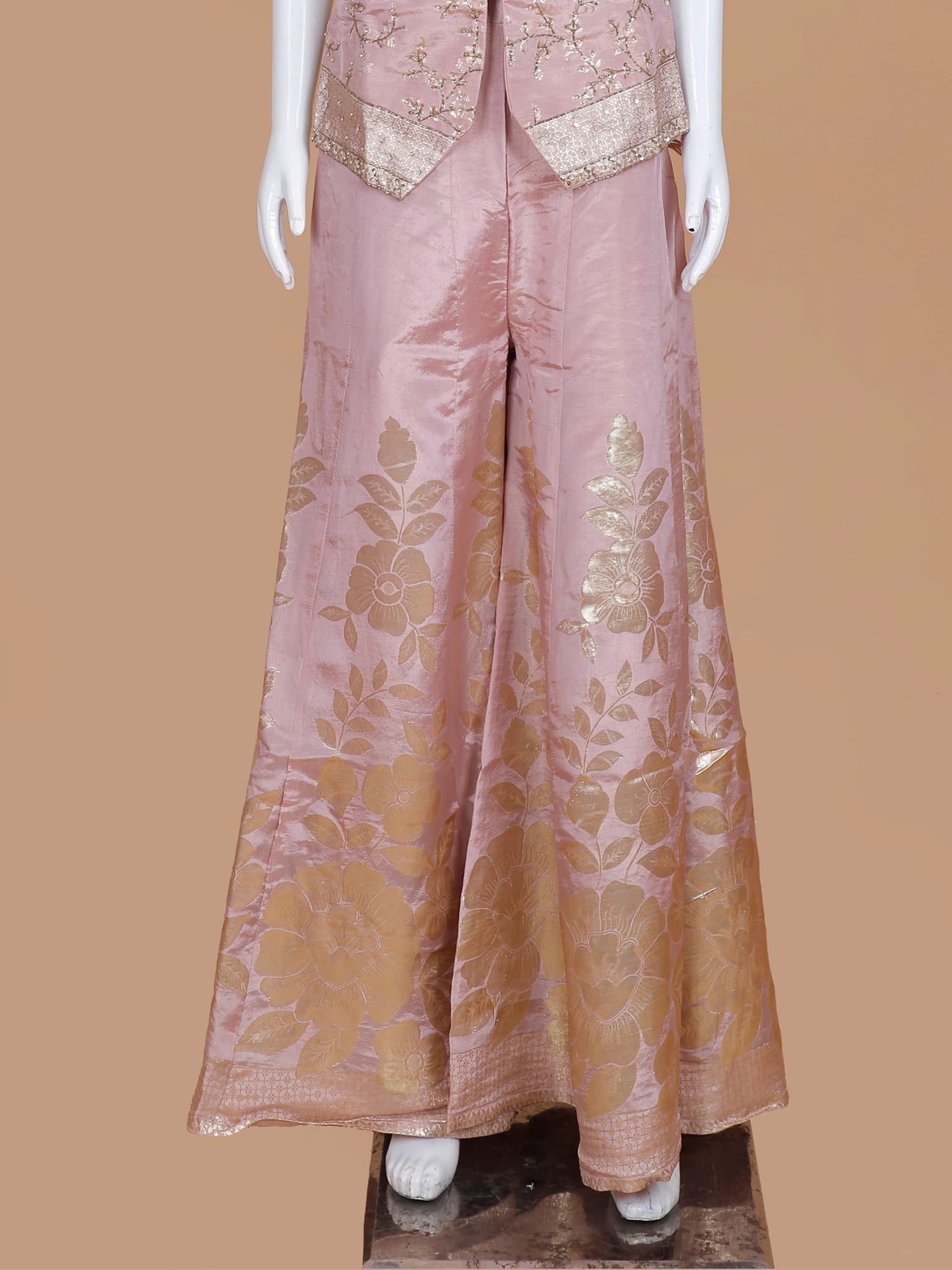 Explore Light Pink Printed Silk Palazzo Suit Showcasing Ruffle Dupatta