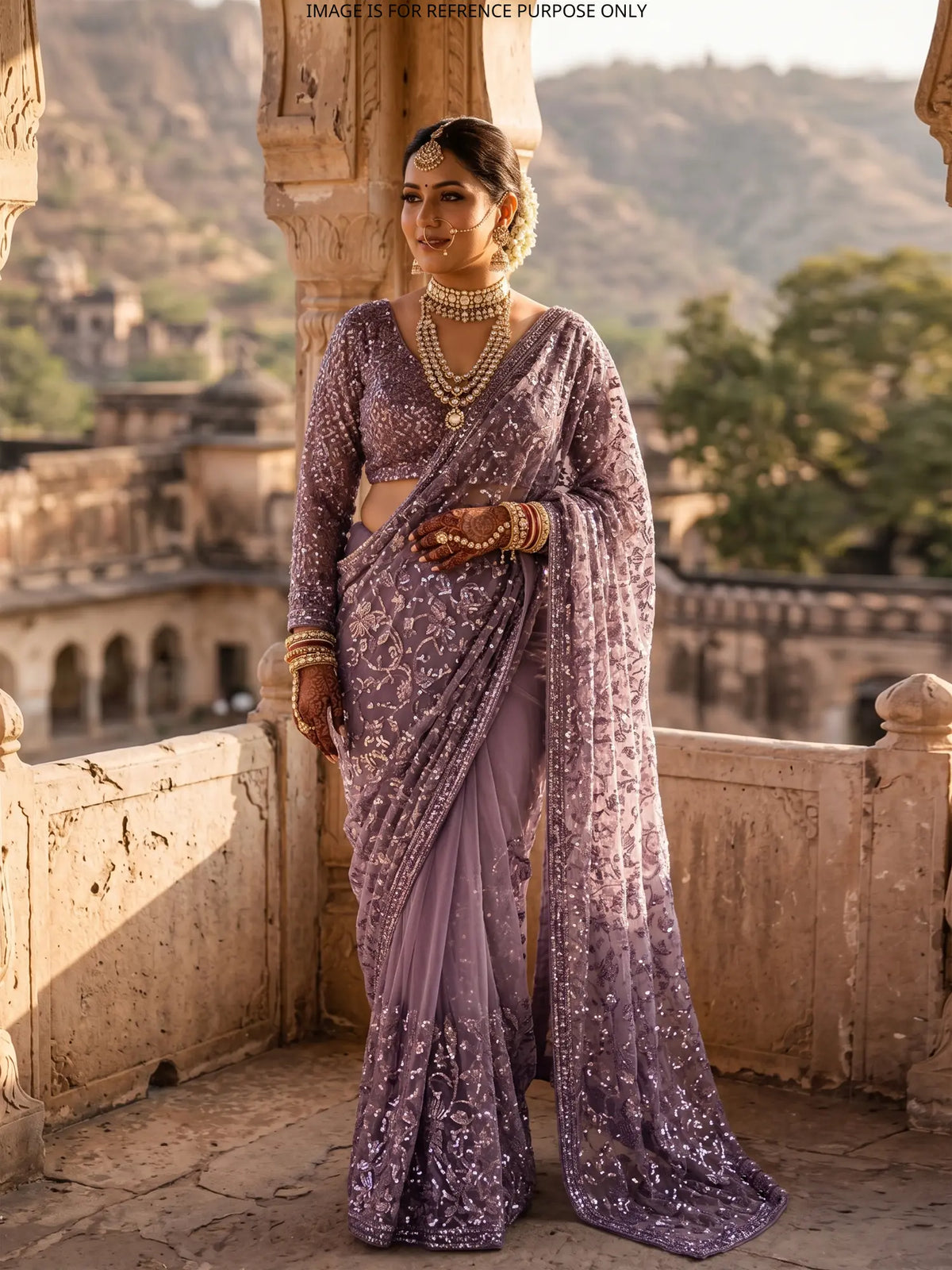 Purple Net Party Wear Saree Featuring Heavy Sequin and Bead Embroidery