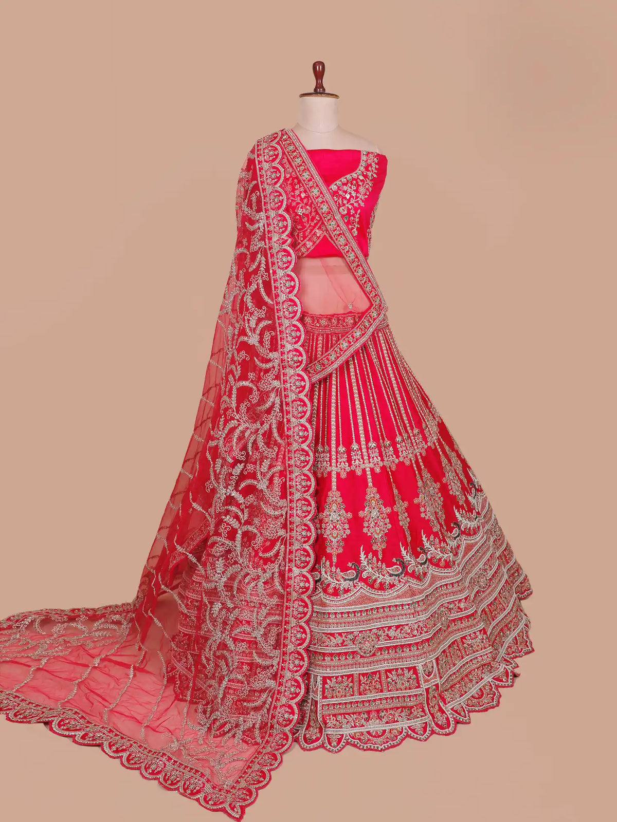 Grand Rani Silk Lehenga Showcasing Peacock Motifs and Layered Embroidery