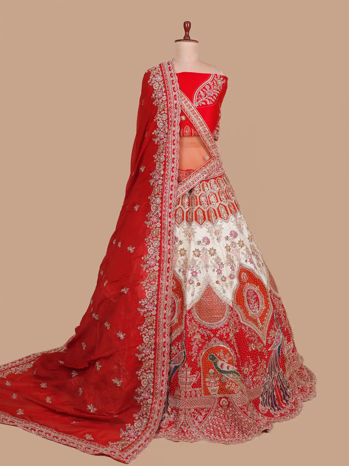 Discover Unique Red Bridal Lehenga Featuring Two-Tone Peacock Embroidery