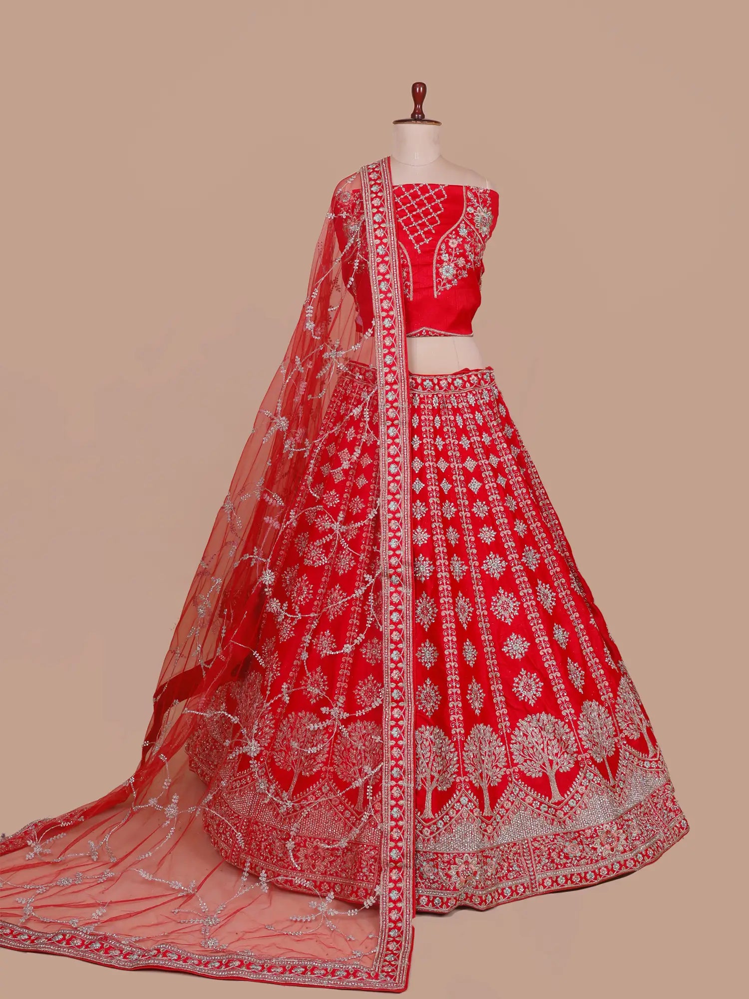 Red Royalty Silk Unstitched Bridal Lehenga Showcasing Tree Embroidery