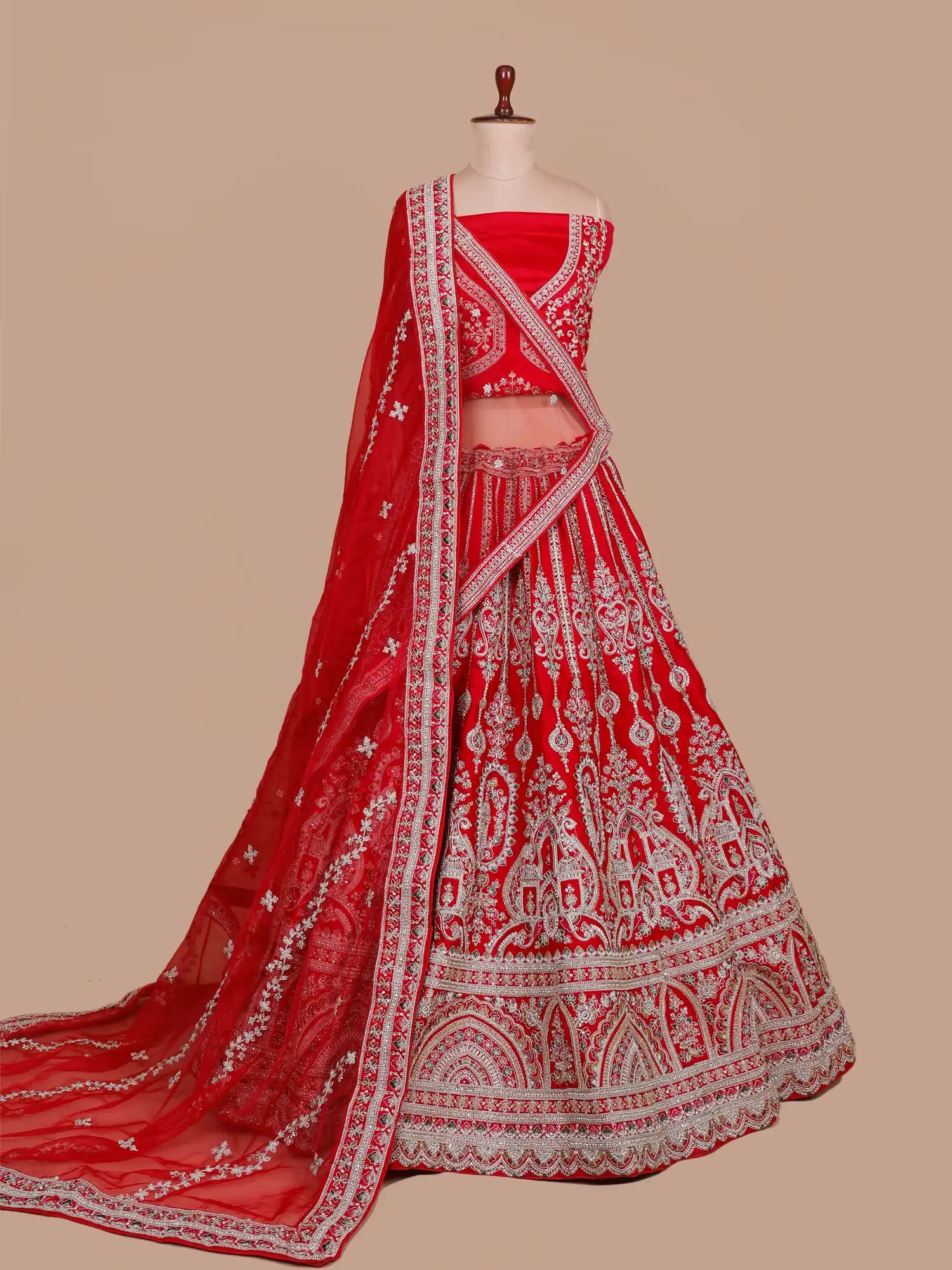 Discover Red Silk Wedding Couture Lehenga Showcasing Traditional Multi Thread Art