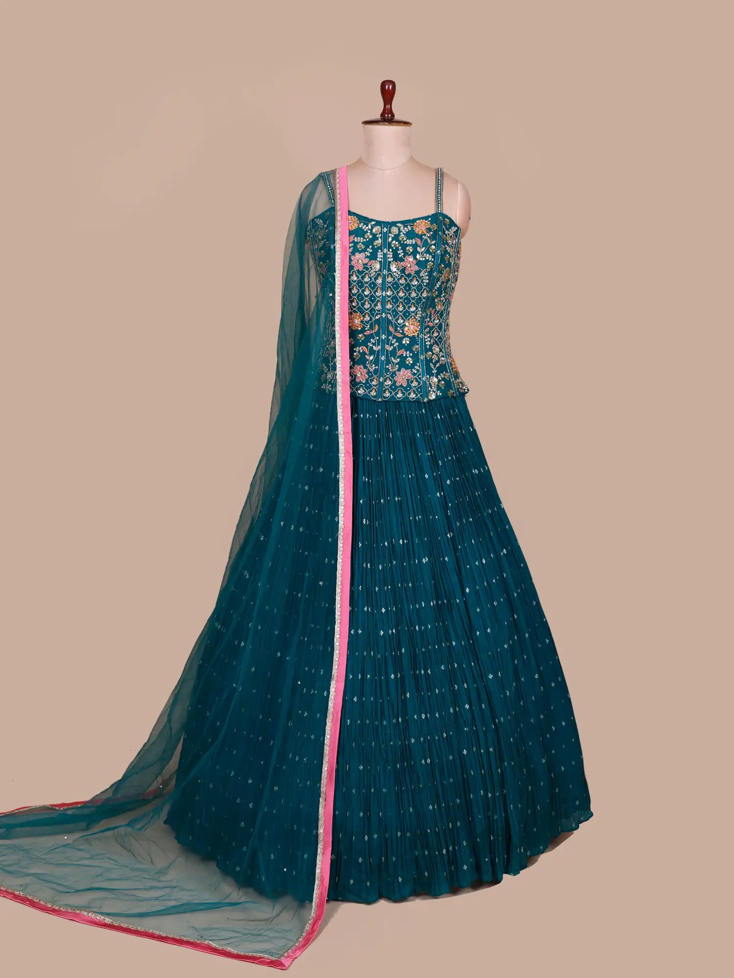 Peacock Green Georgette Peplum Lehenga Ensemble With Multi-Thread Mirror Craft