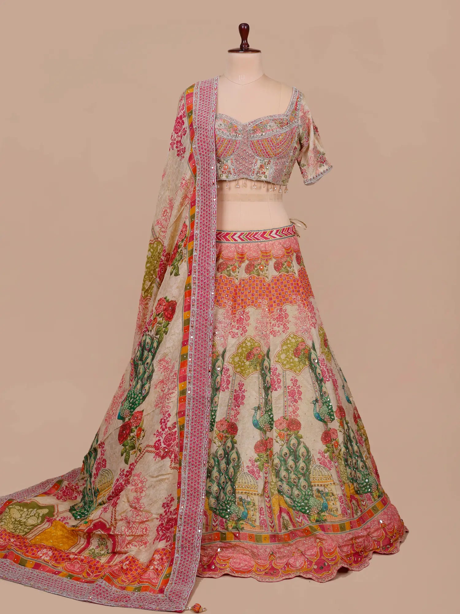 Get Bollywood Style Multi Color Silk Lehenga Mirror Work Design