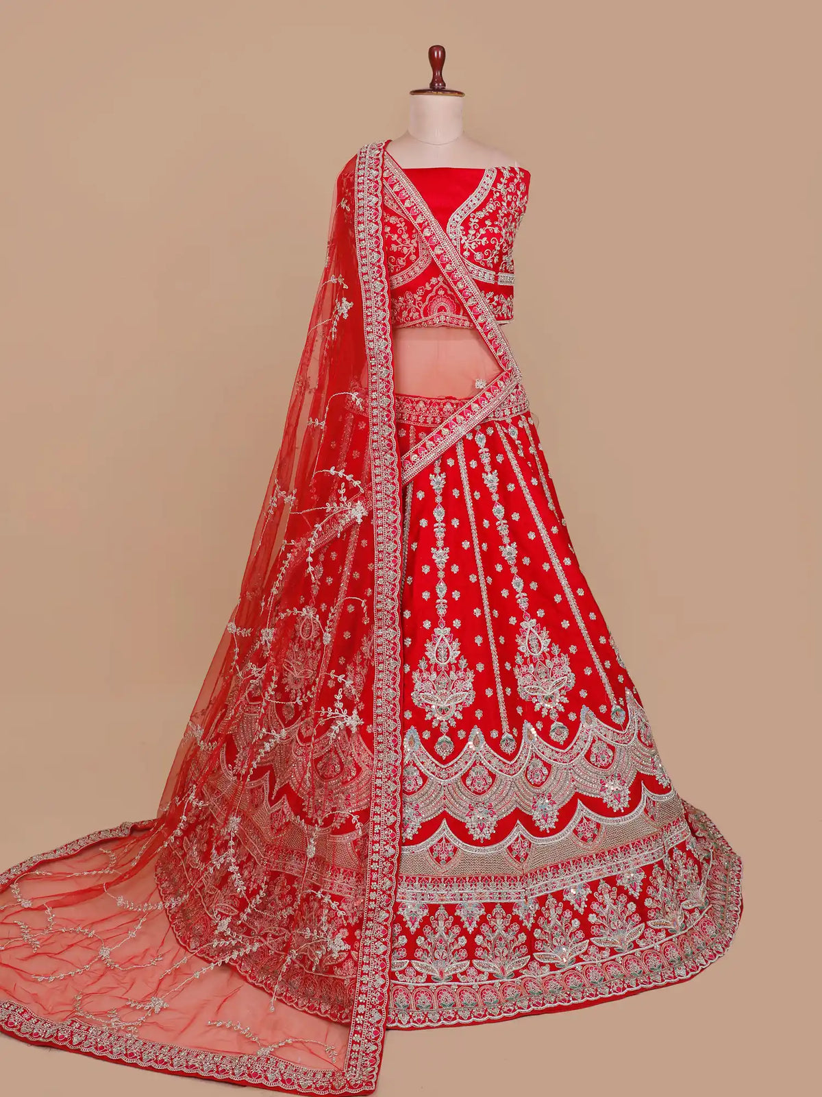 Bridal Ruby Silk Lehenga Featuring Layered Floral Embroidery Work