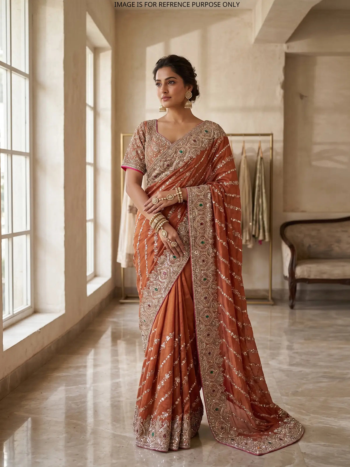 Rust Orange Giraffe Fabric Saree Featuring Gemstone Border Artistry