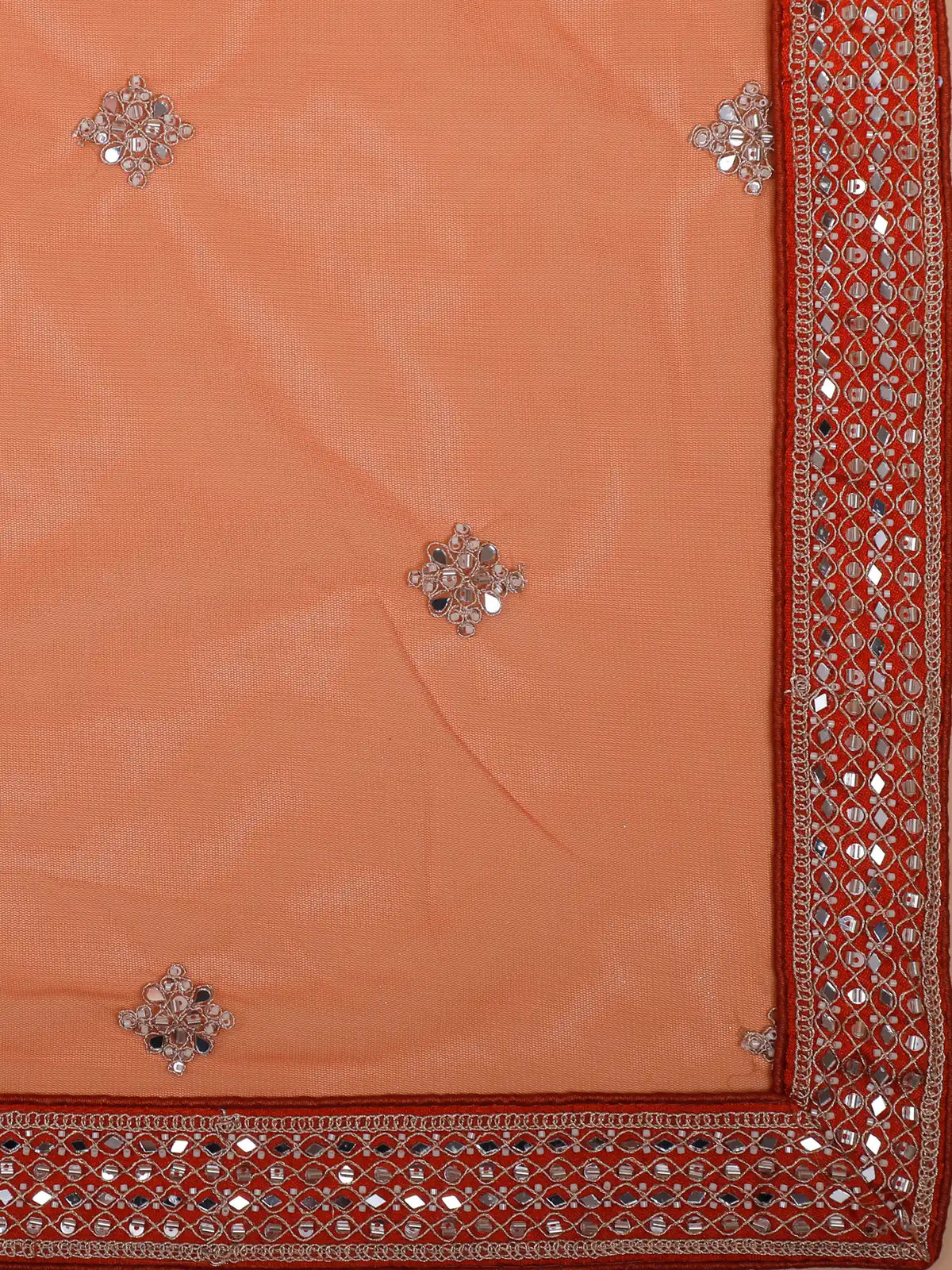 Rust Orange Silk Wedding Lehenga Showcasing Statement Mirror Embroidery