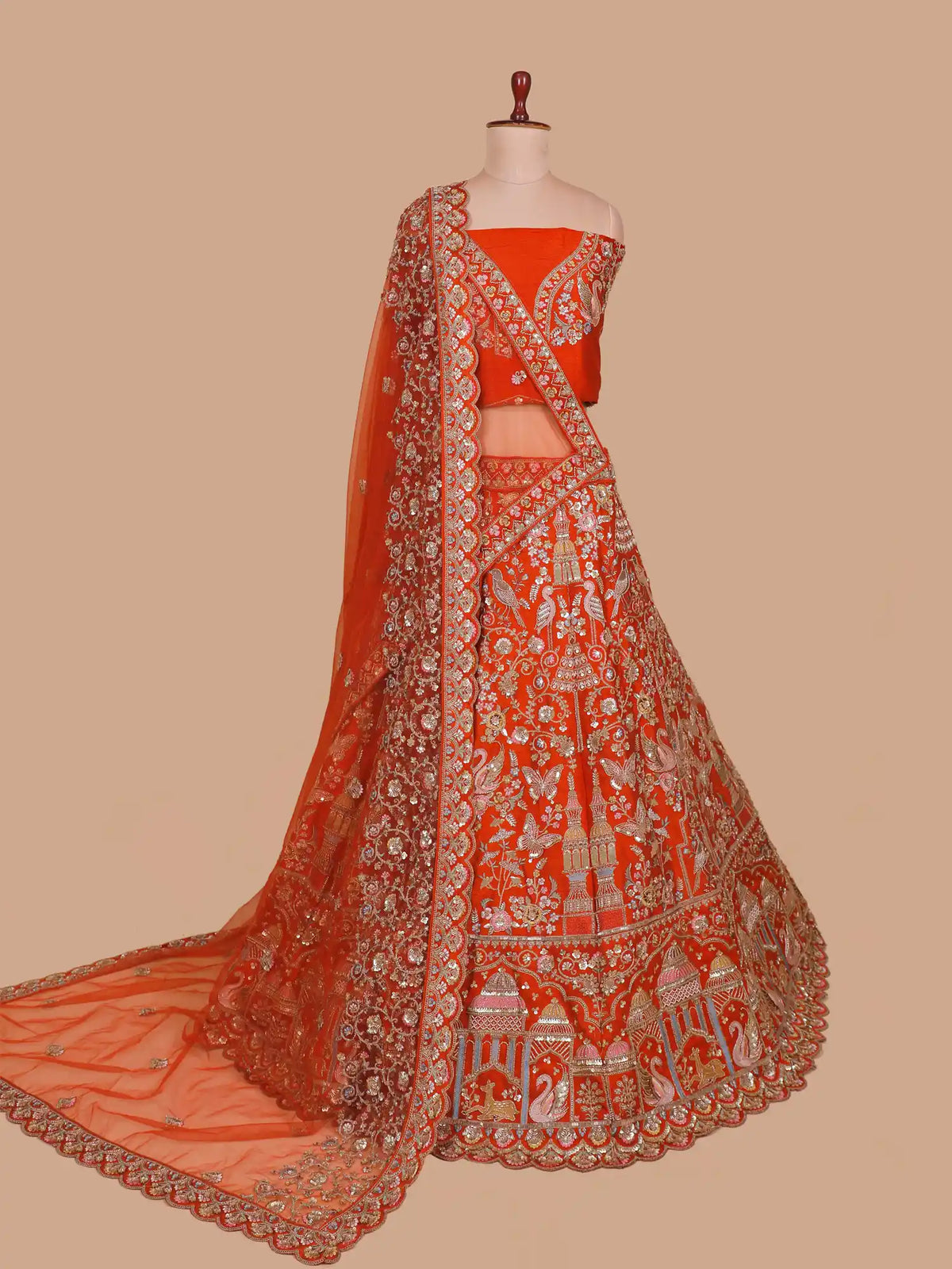 Exclusive Rust Orange Silk Lehenga Featuring Swans and Architectural Motifs
